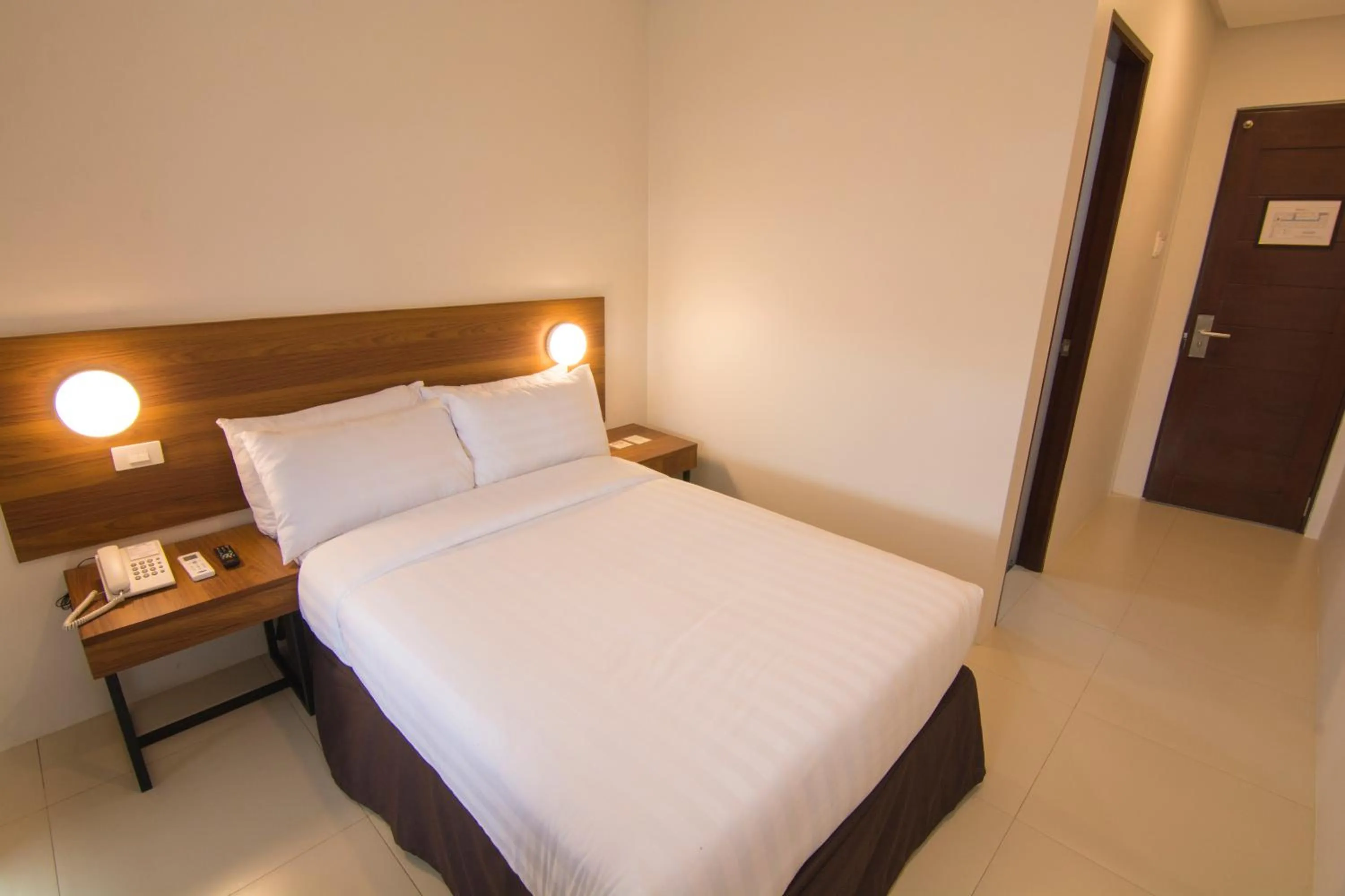 Bed in Mango Suites Cauayan