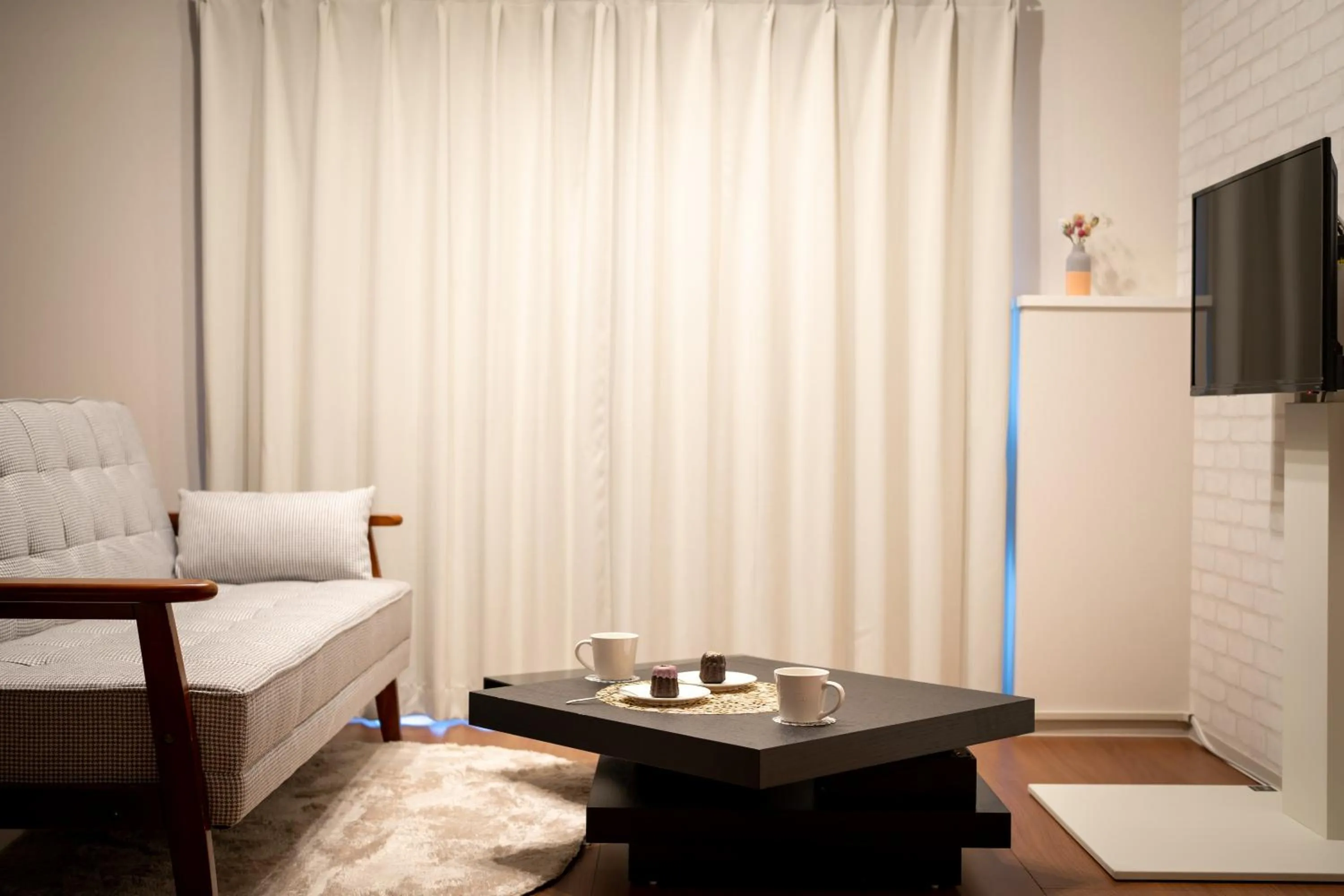 Living room, Bed in BON Condominium Umeda