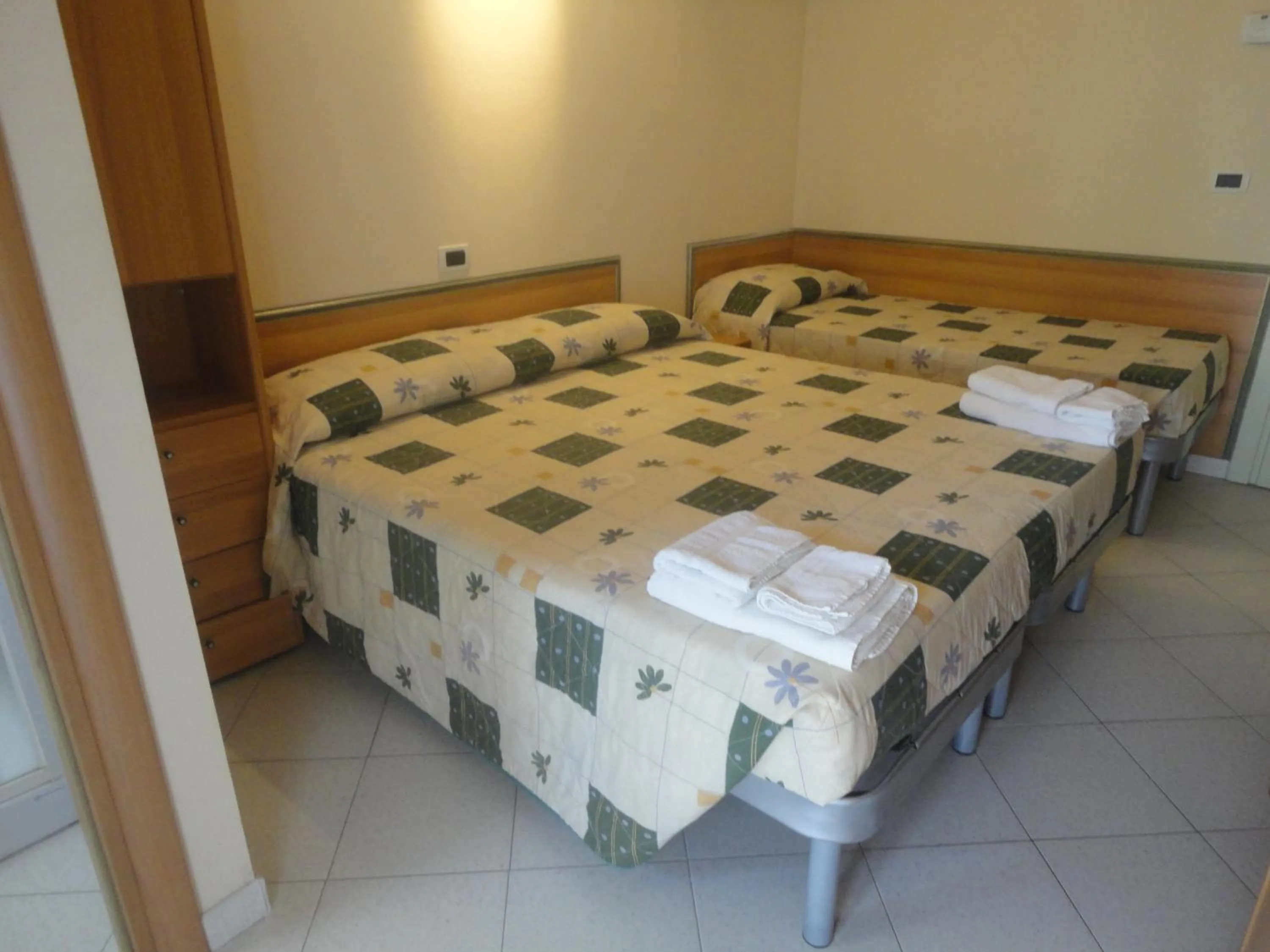 Bed in Hotel Al Ragno