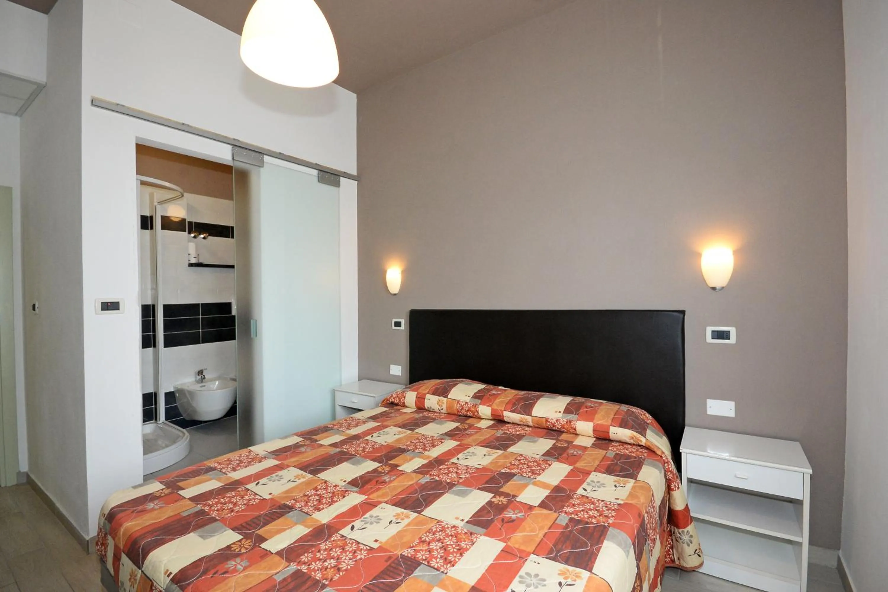 Bed in Hotel Al Ragno