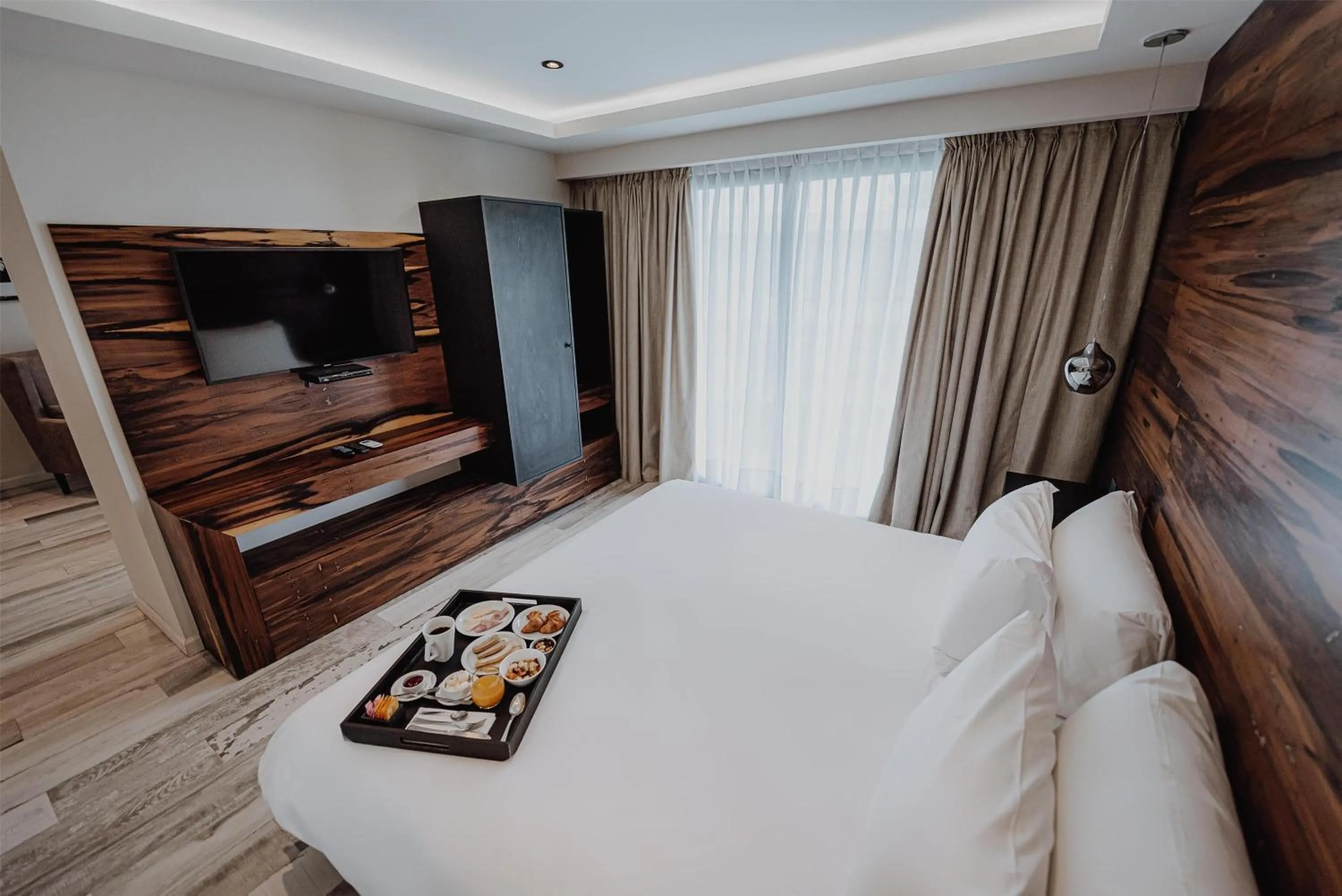 Photo of the whole room, Bed in La Urumpta Hotel, AKEN MIND