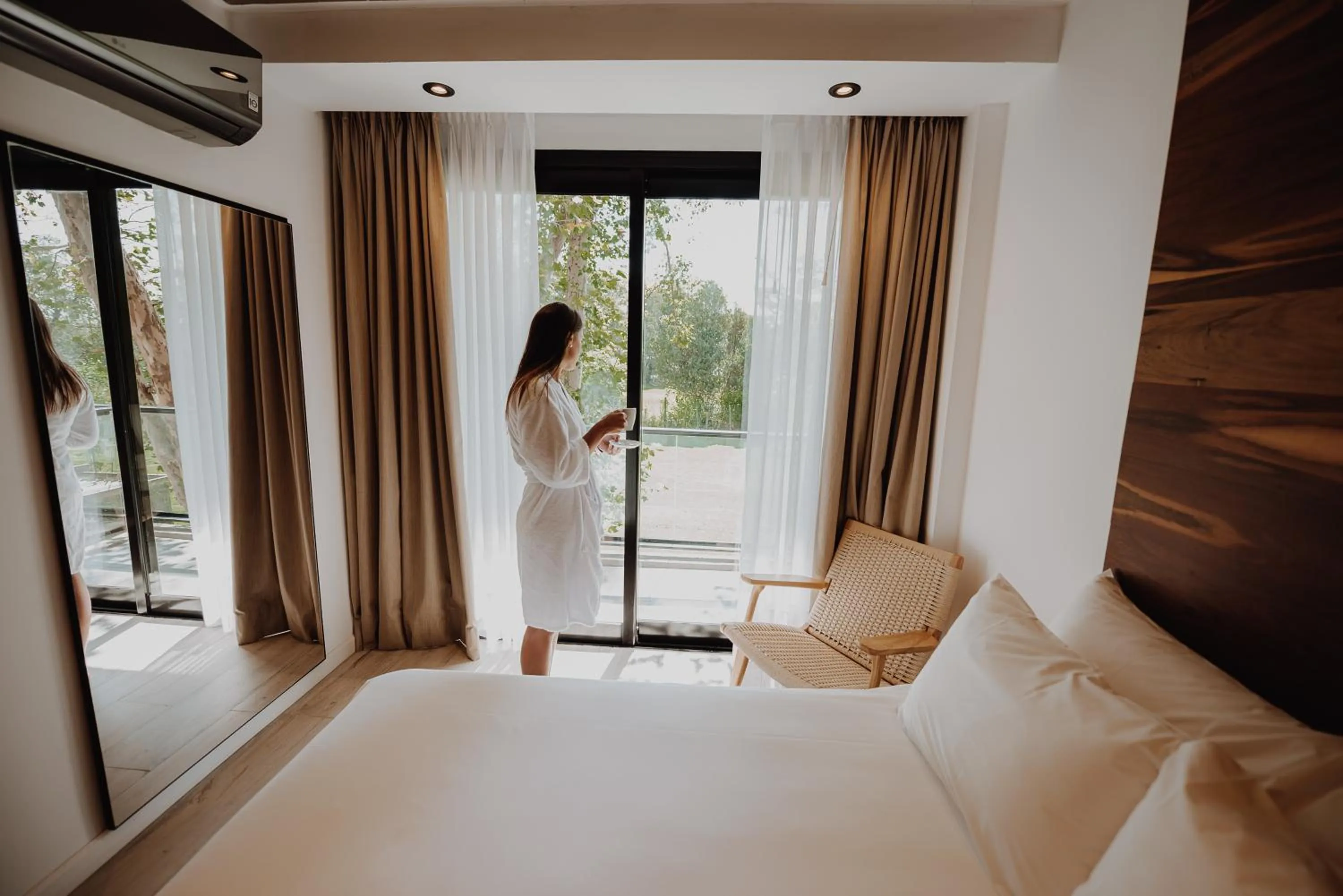 Seating area, Bed in La Urumpta Hotel, AKEN MIND