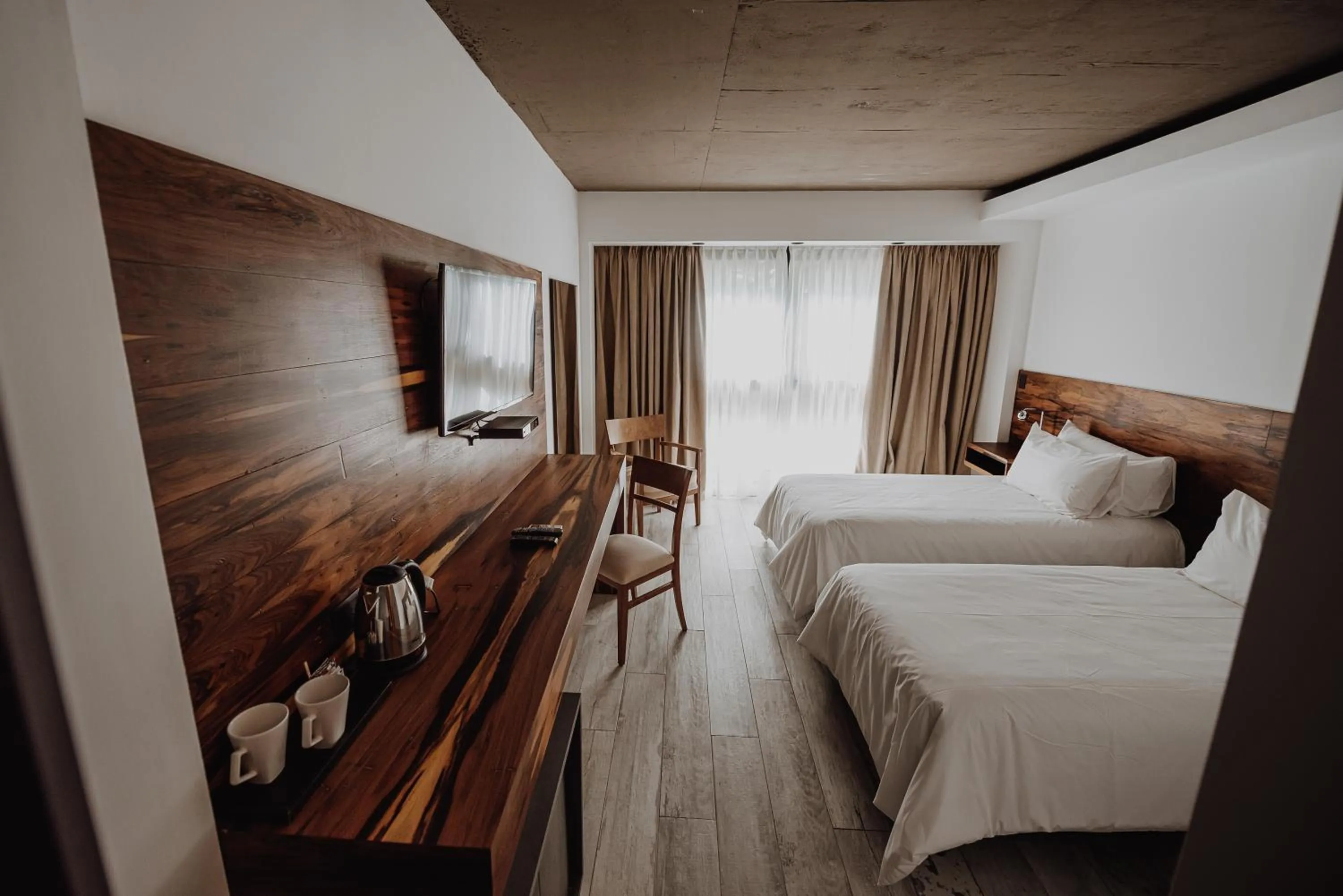 Bed in La Urumpta Hotel, AKEN MIND