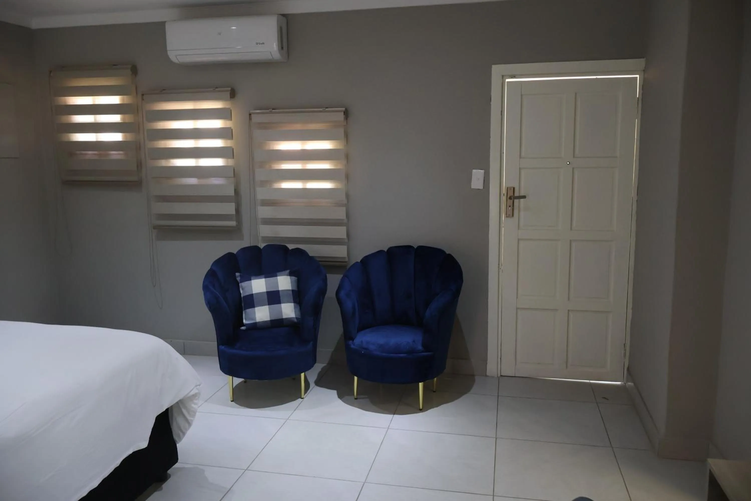 Seating area, Bed in Boksburg Hotel