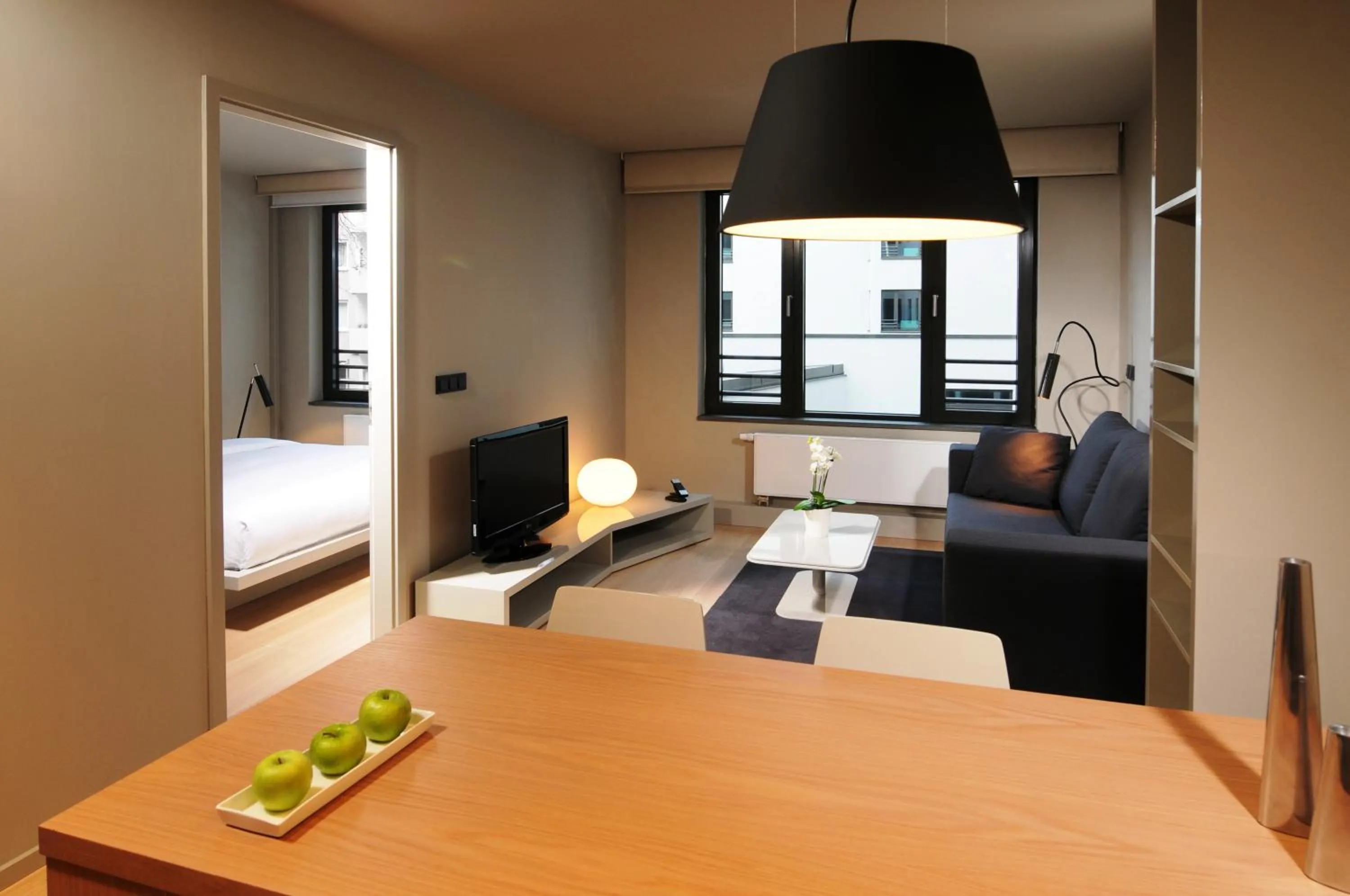 Living room, Bed in SANA Berlin Residence