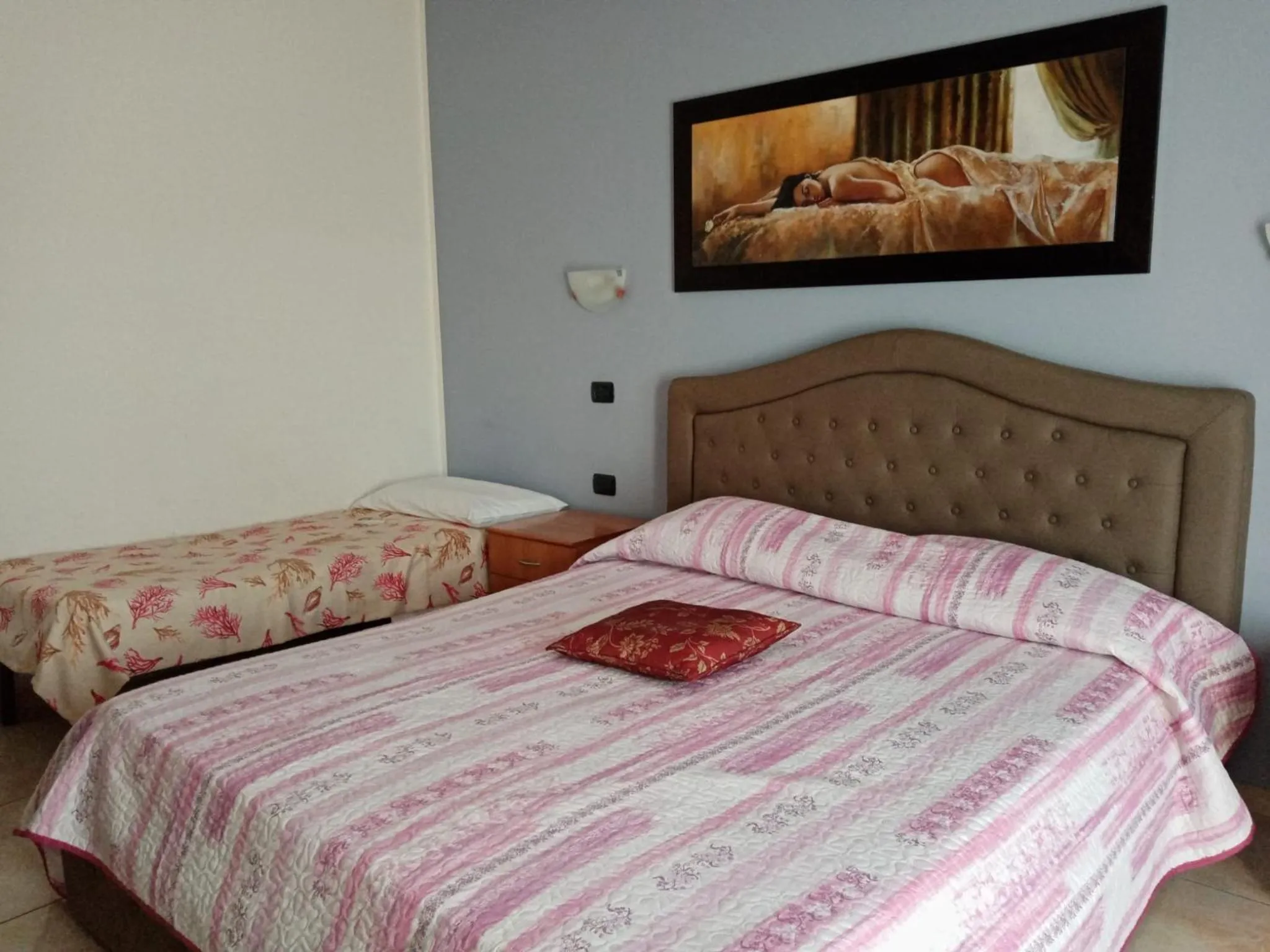 Bed in Hotel De Rosa