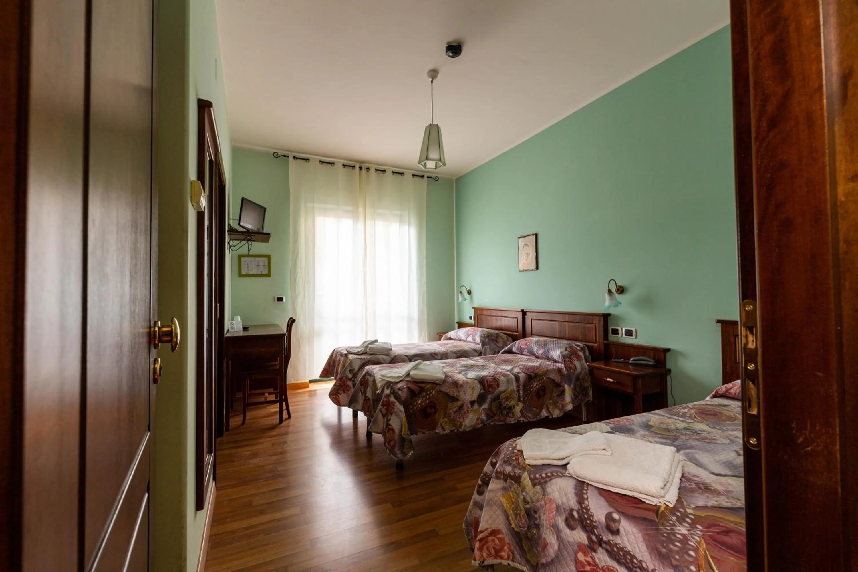 Bedroom, Bed in Hotel Pina Ristorante