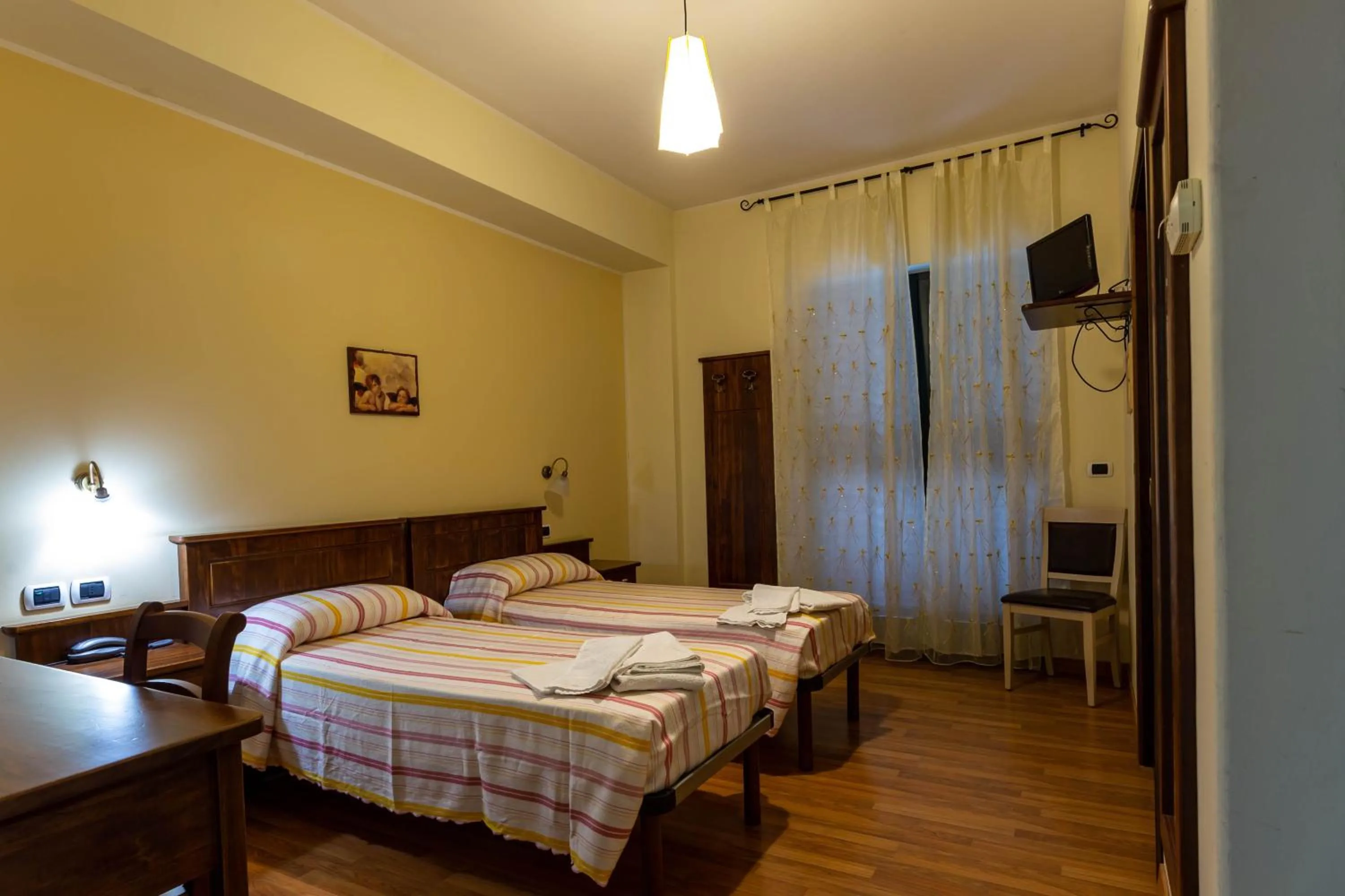 Bedroom, Bed in Hotel Pina Ristorante