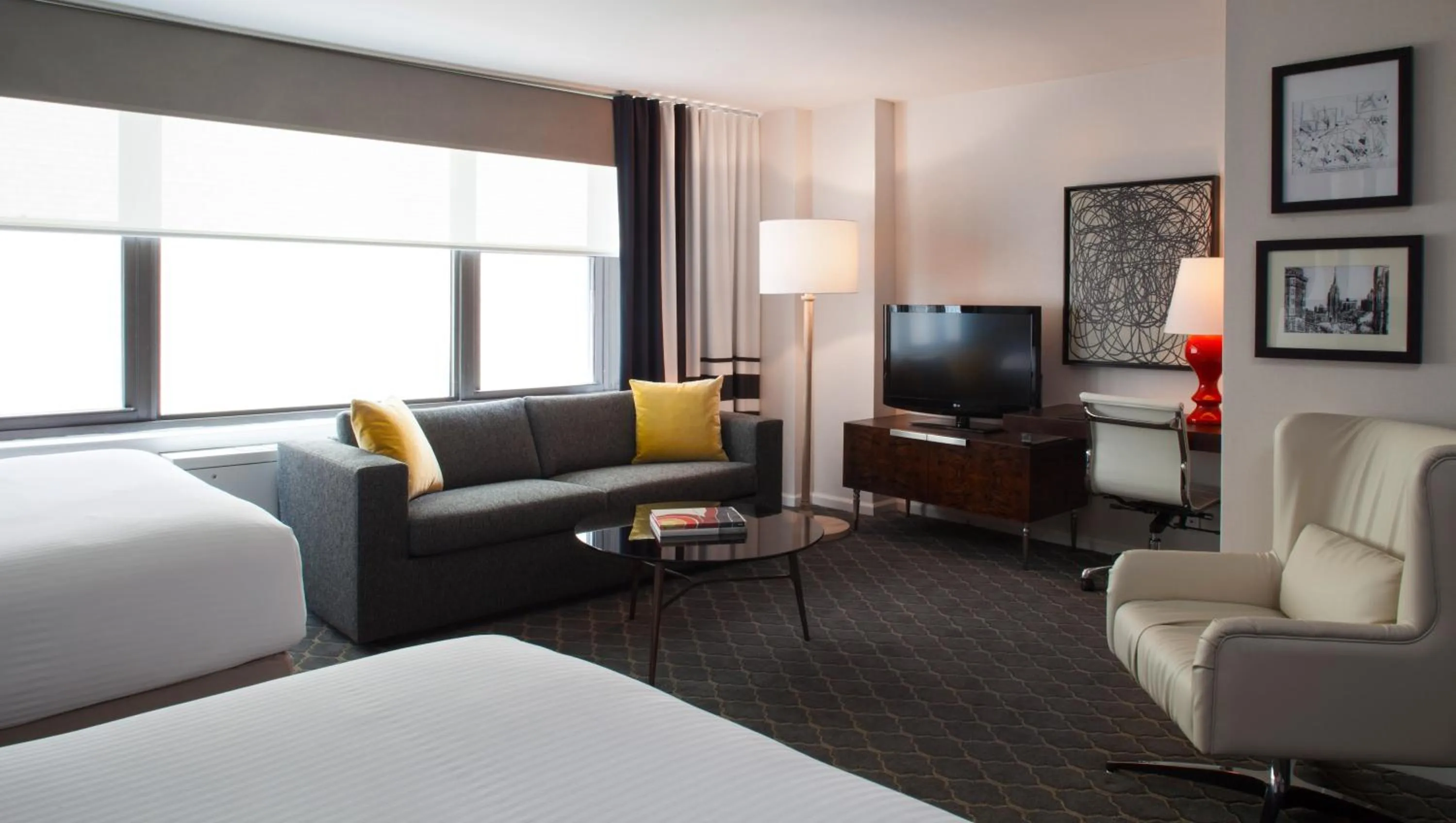 Photo of the whole room, Bed in The Fifty Sonesta Hotel New York