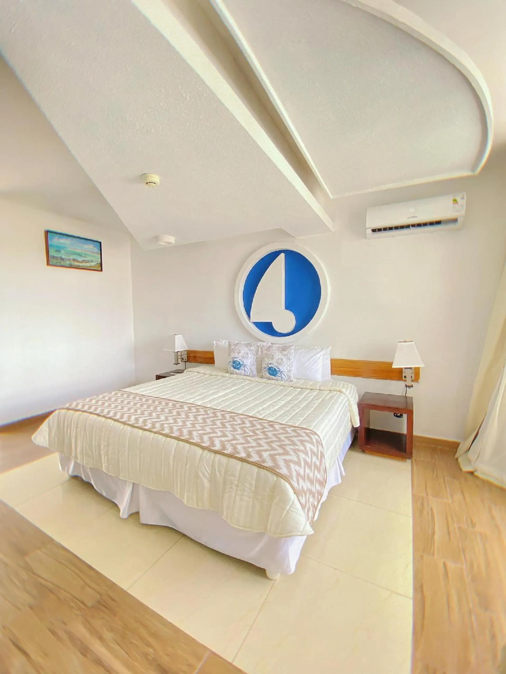 Bed in Aquarius Hotel Boutique