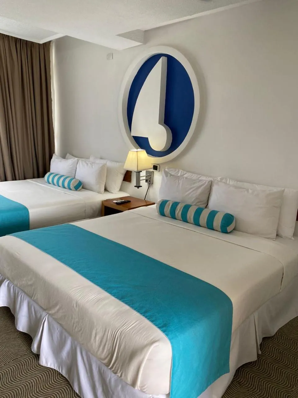 Bed in Aquarius Hotel Boutique