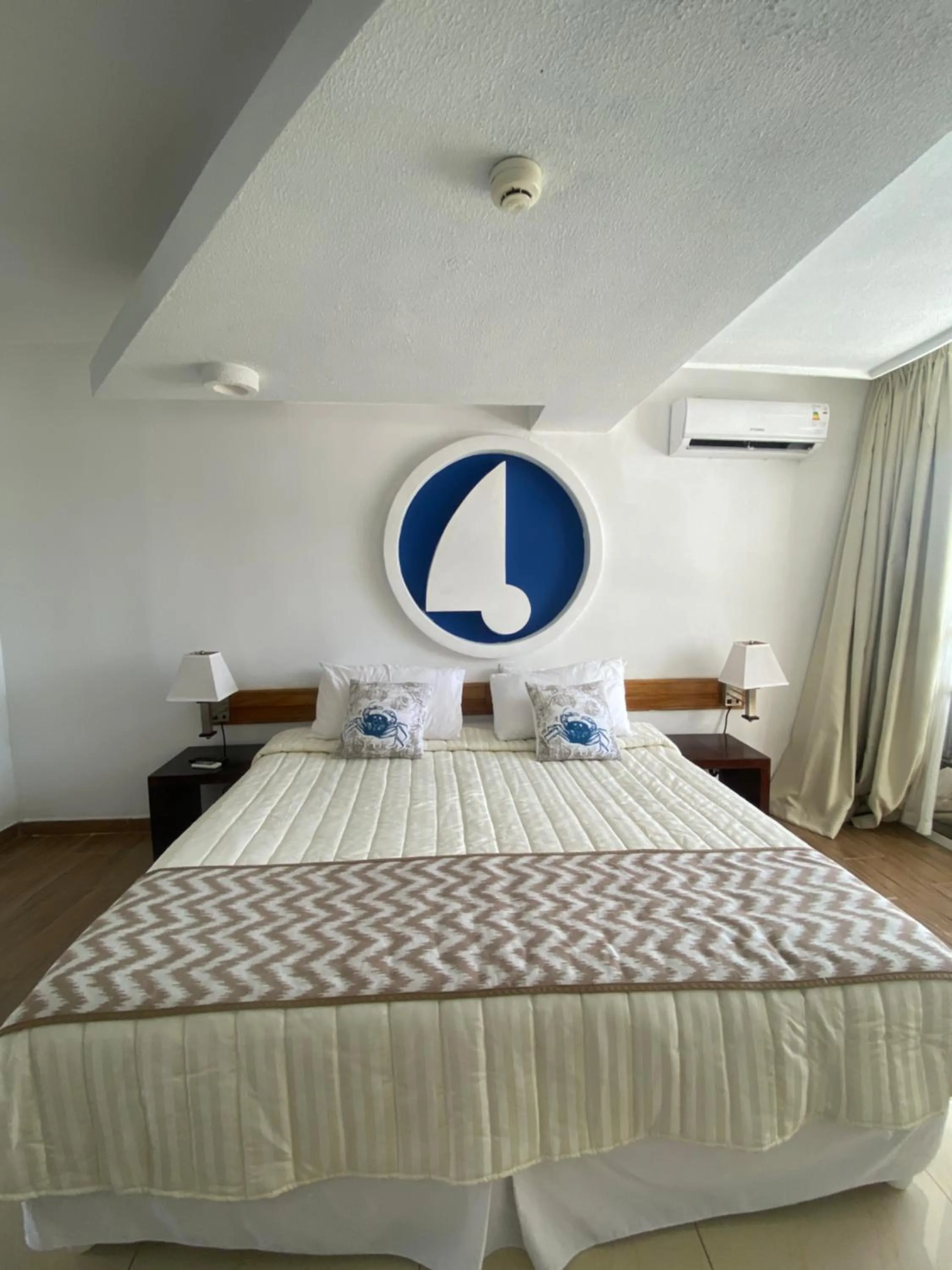 Bed in Aquarius Hotel Boutique