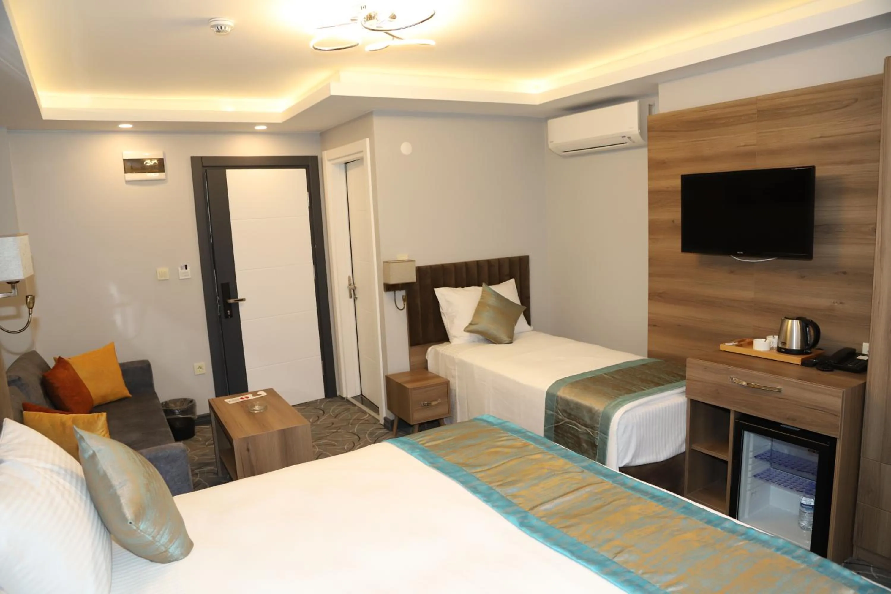 Bed in Grand Kavi Hotel