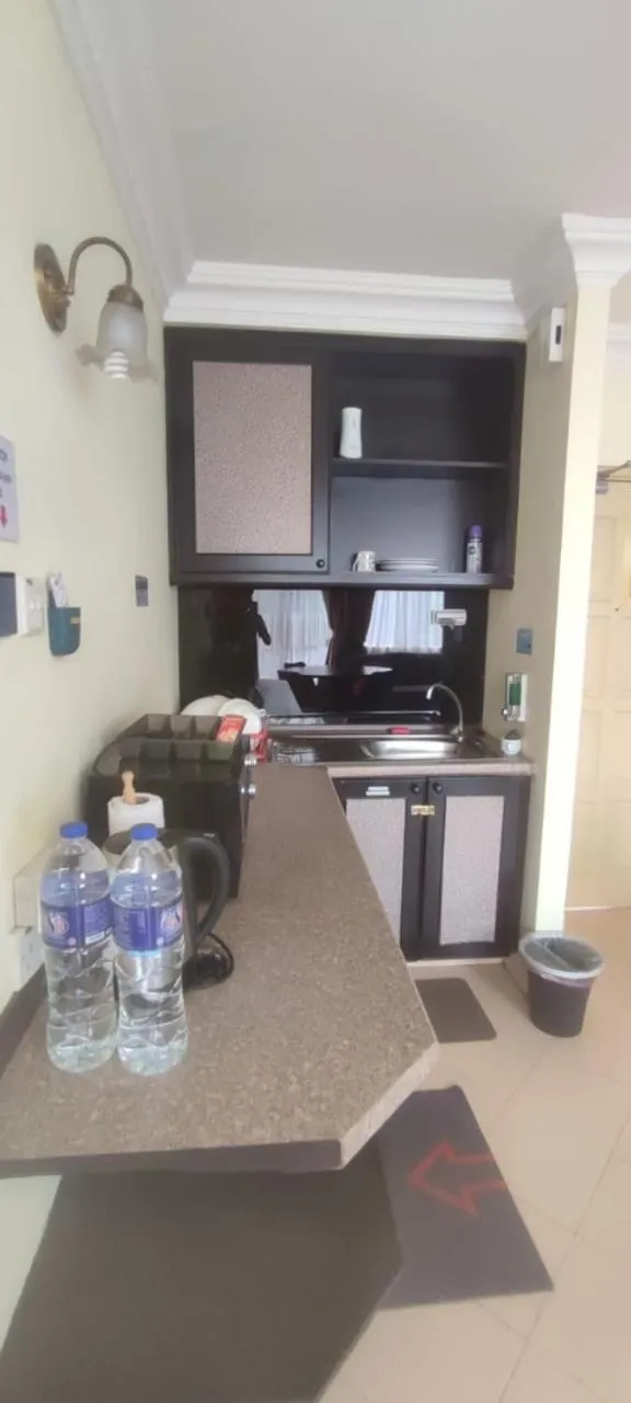 Kitchen or kitchenette in D'Vista Homestay Apartments in Desaru Beach Resort