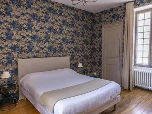 Bed in Maison du Moulin
