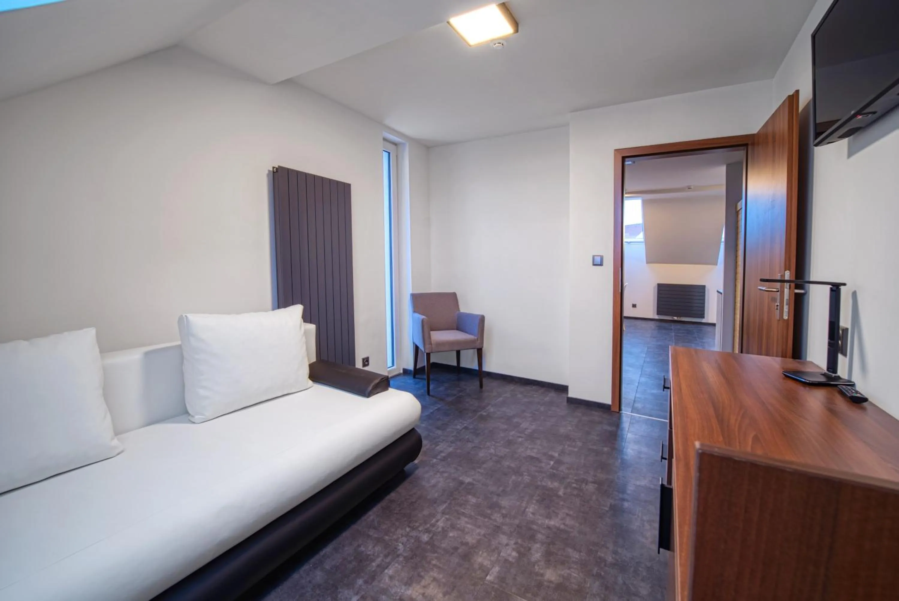 Living room, Bed in Národní dům Podbořany