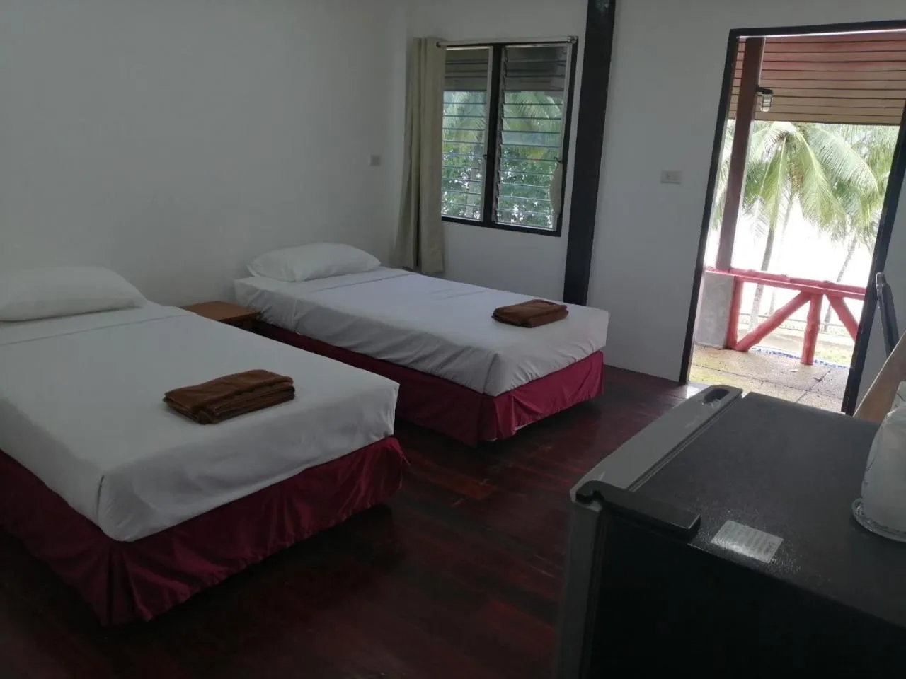 Bed in Jansom Beach Resort