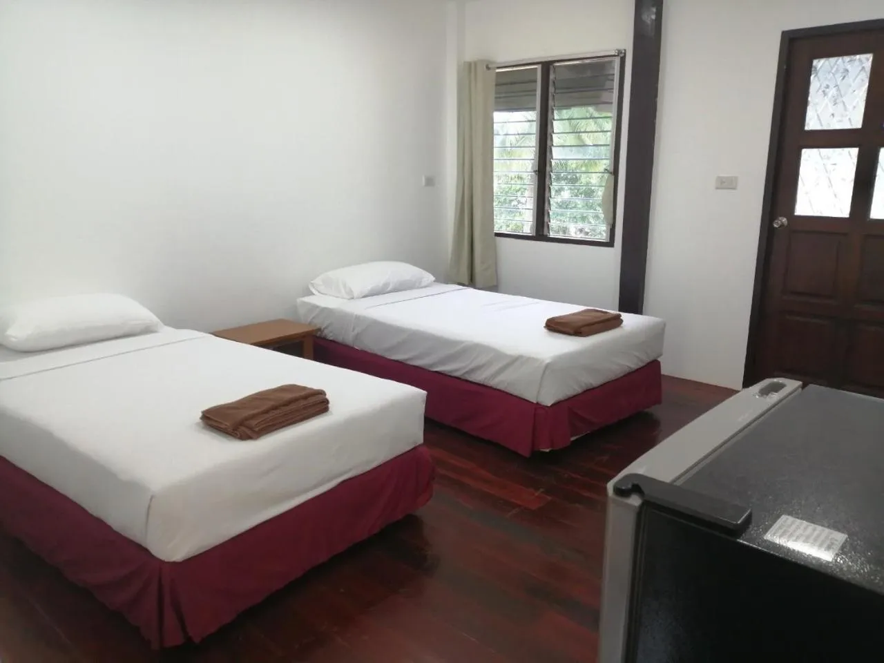 Bed in Jansom Beach Resort