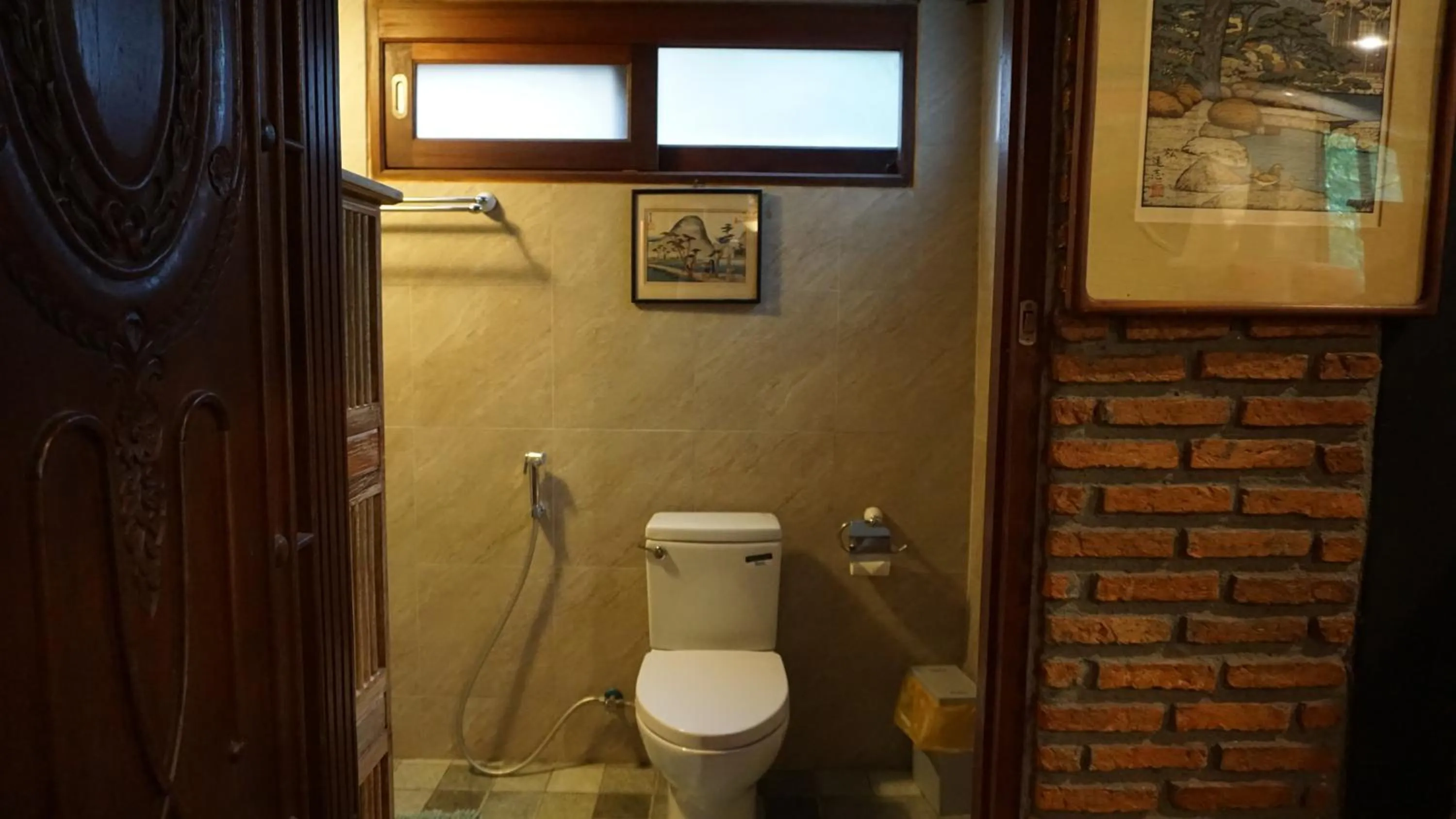 Toilet in Cattani's Riverside Home