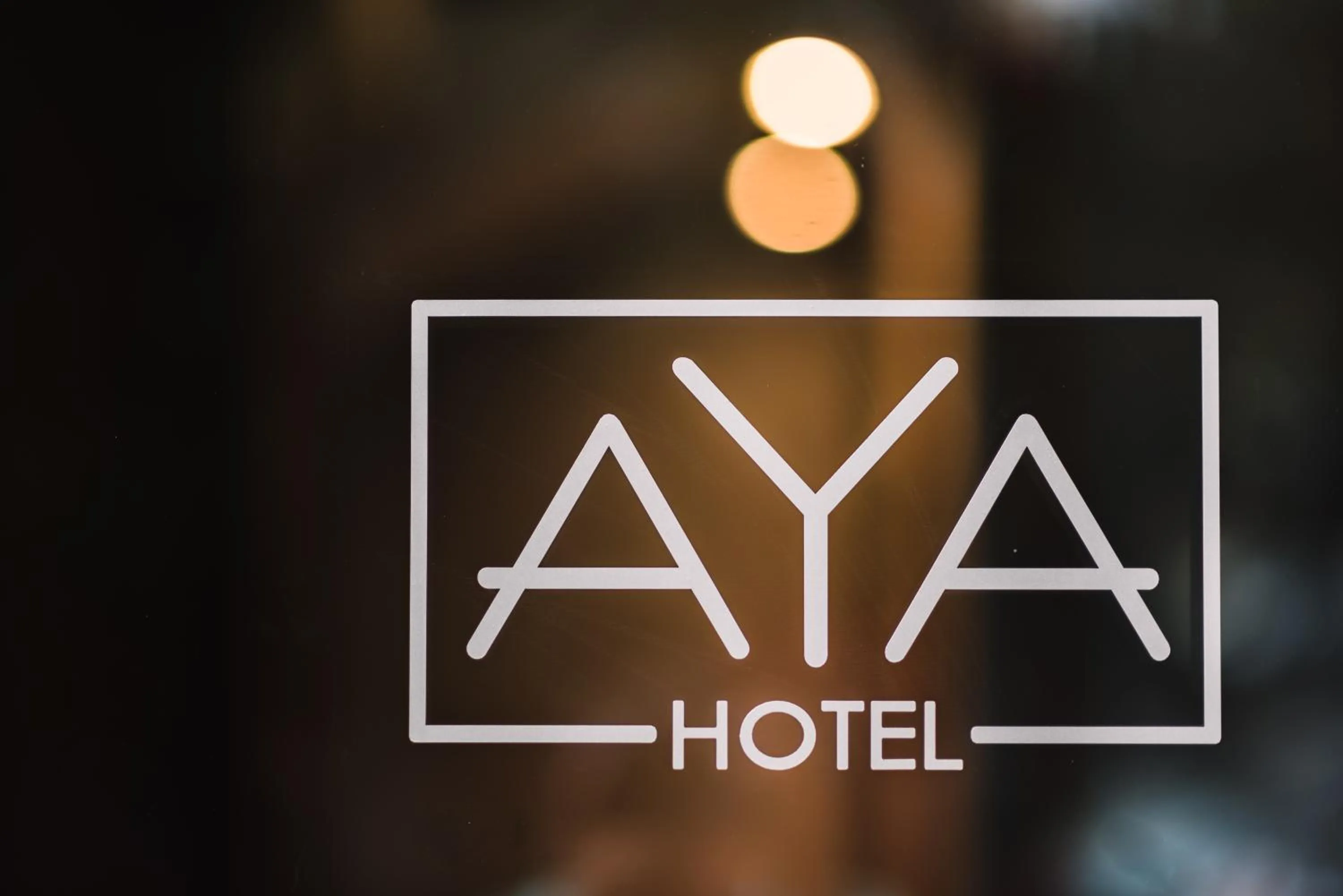 Property logo or sign in Aya Hotel