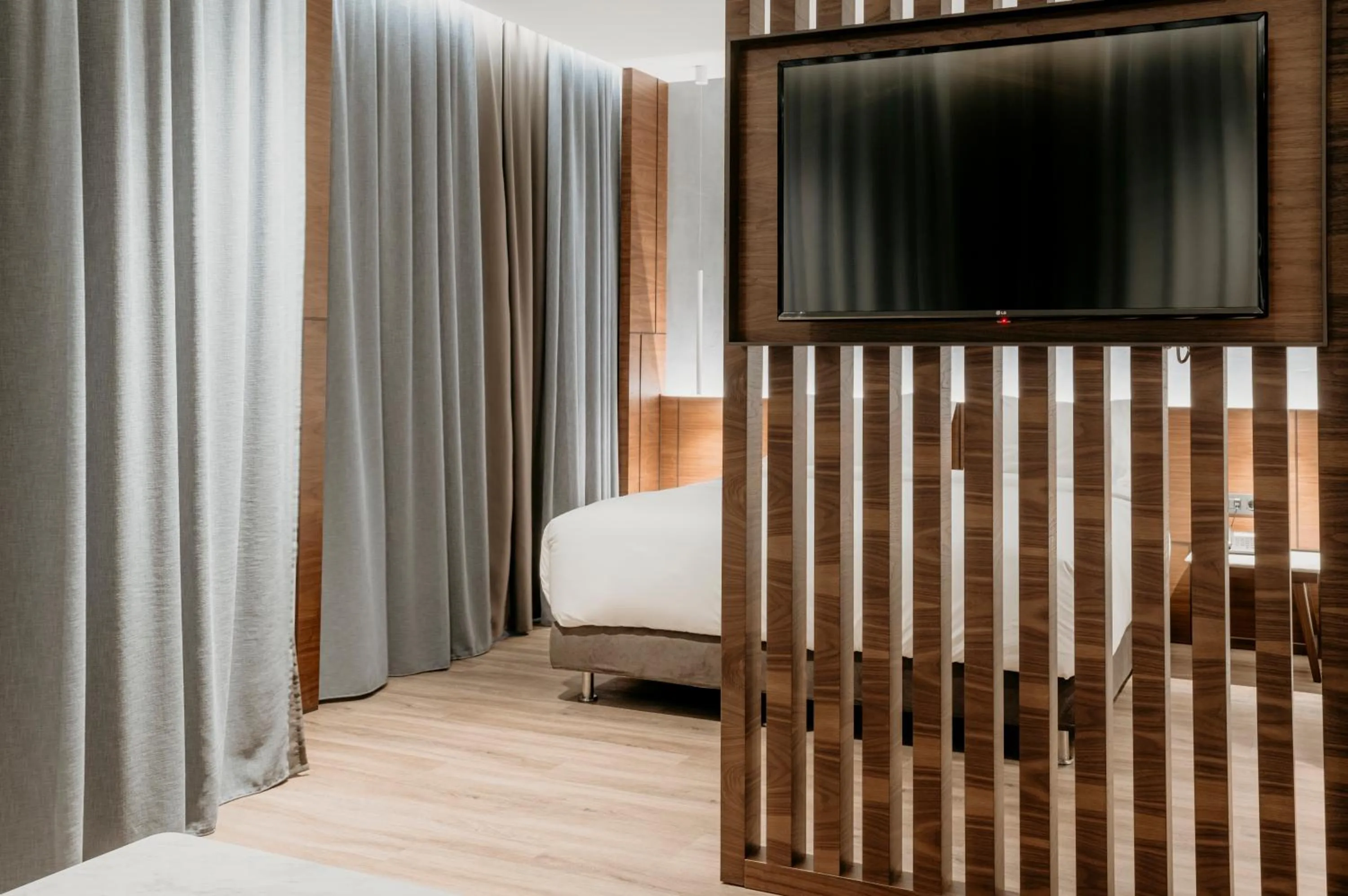 TV and multimedia, Bed in Aya Hotel