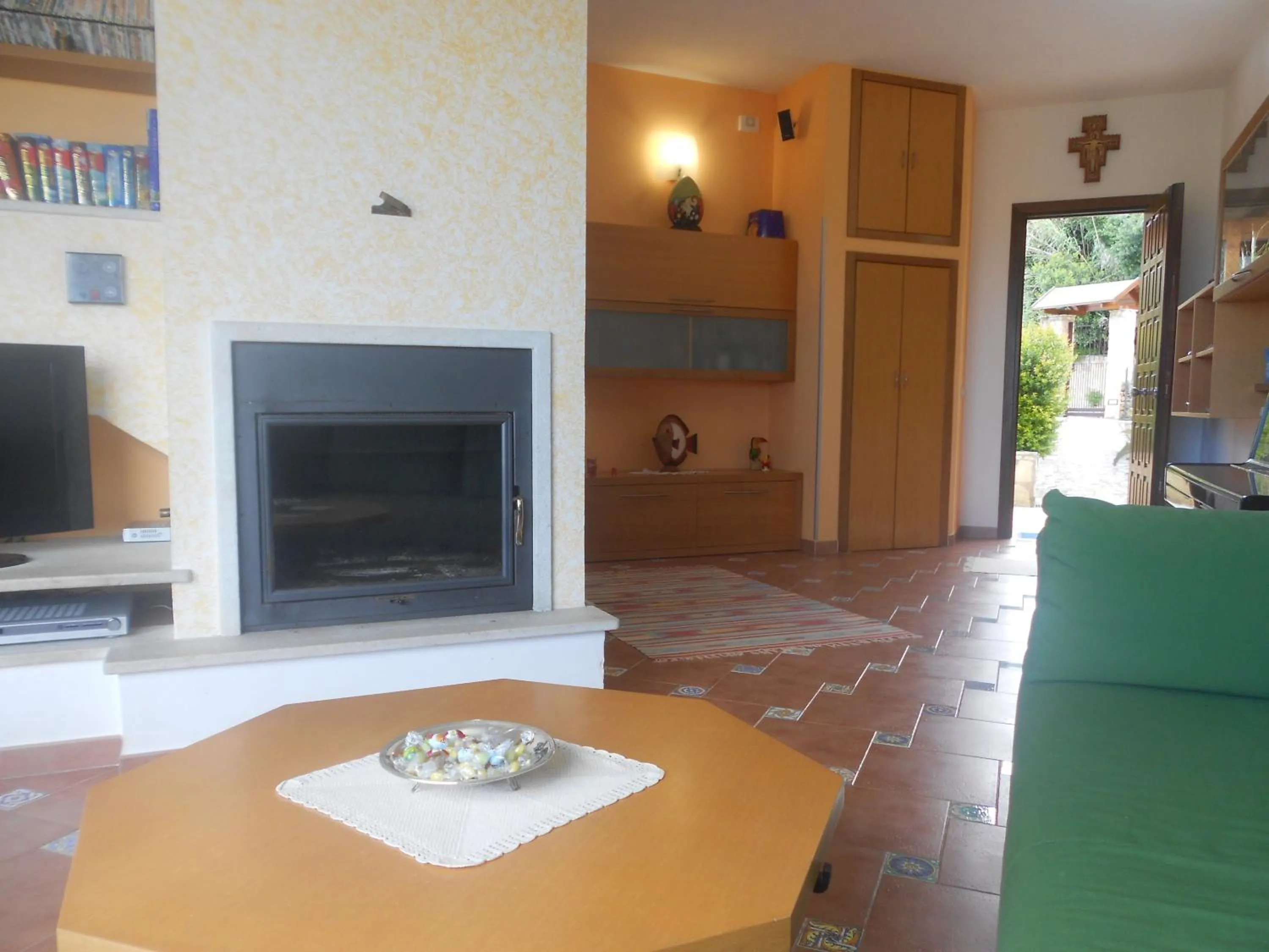 Communal lounge/ TV room in B&B Verdeblu