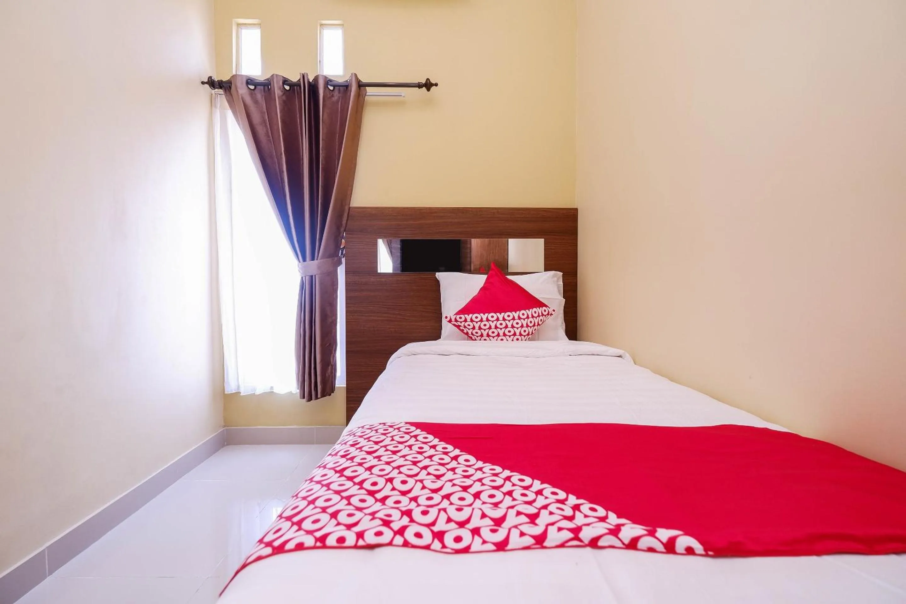 Bedroom in Super OYO 1506 Shabrina 2 Syariah