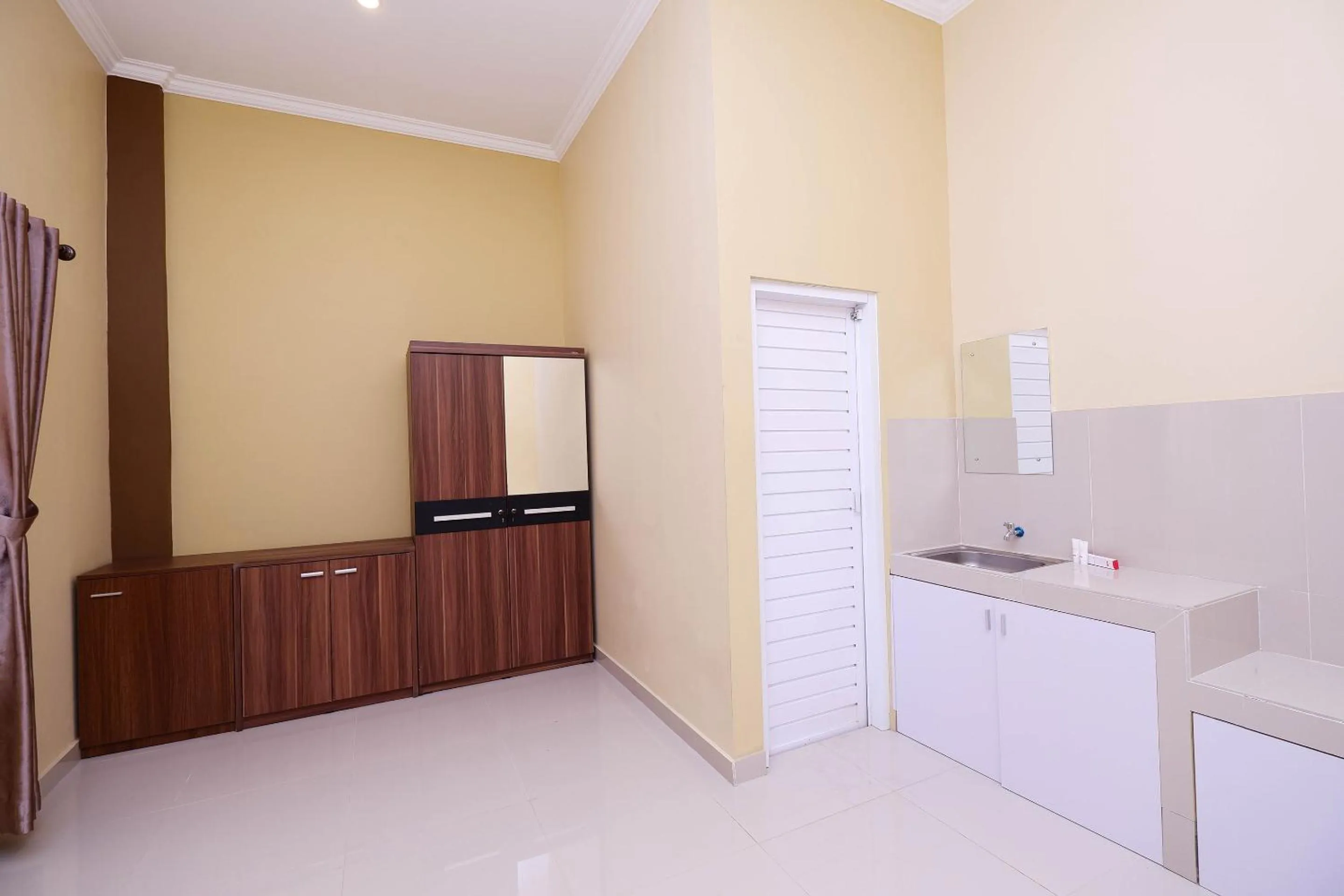 Bedroom in Super OYO 1506 Shabrina 2 Syariah