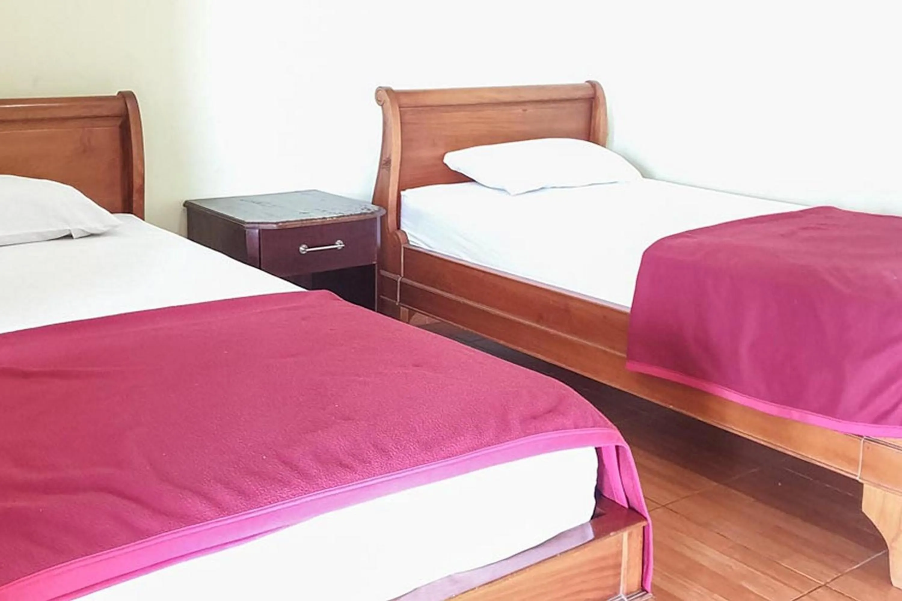 Bed in Hotel Bumi Bermi Permai near Bermi Eco Park Mitra RedDoorz