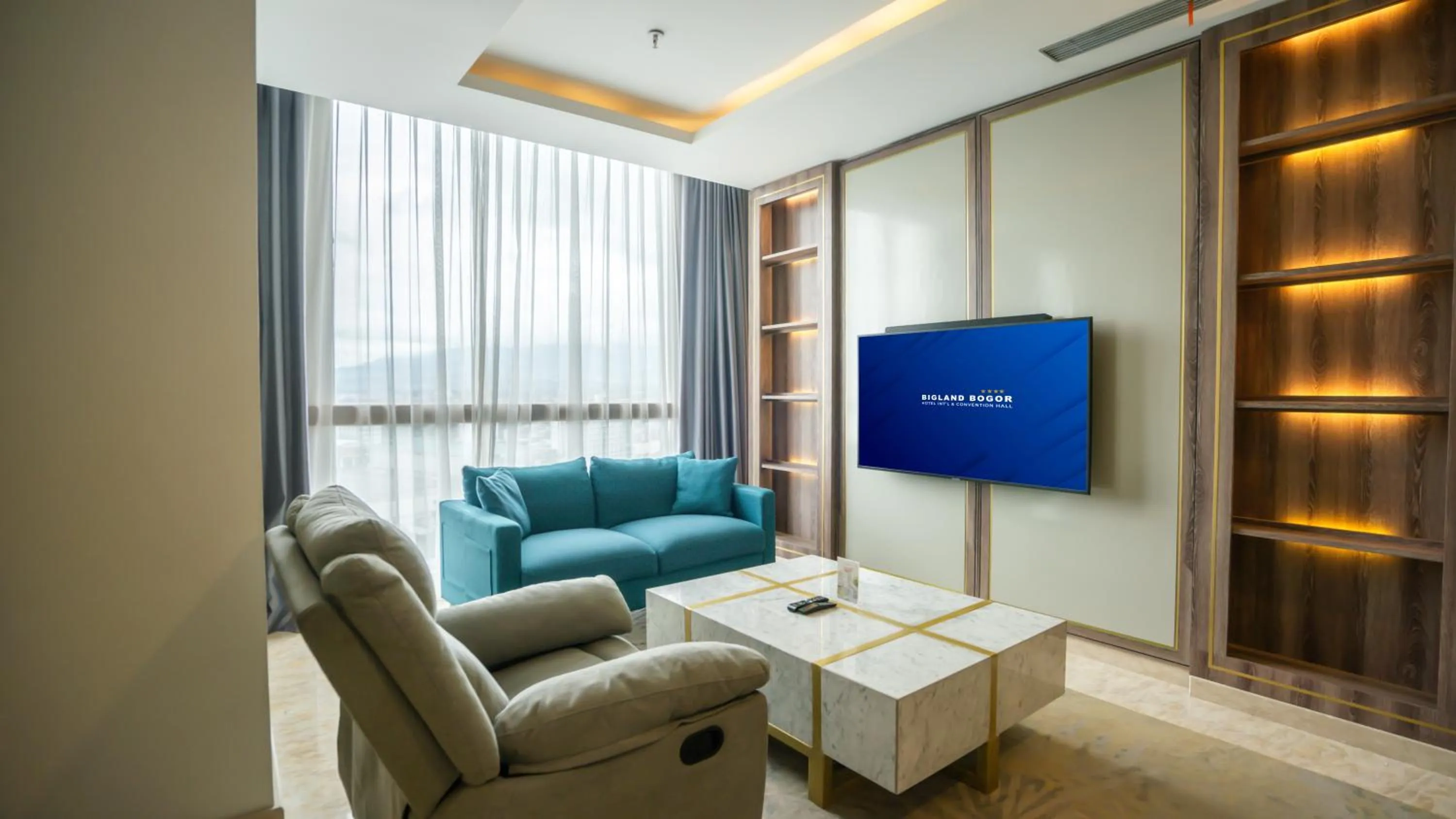 Living room in Bigland Bogor Hotel Powered by Archipelago