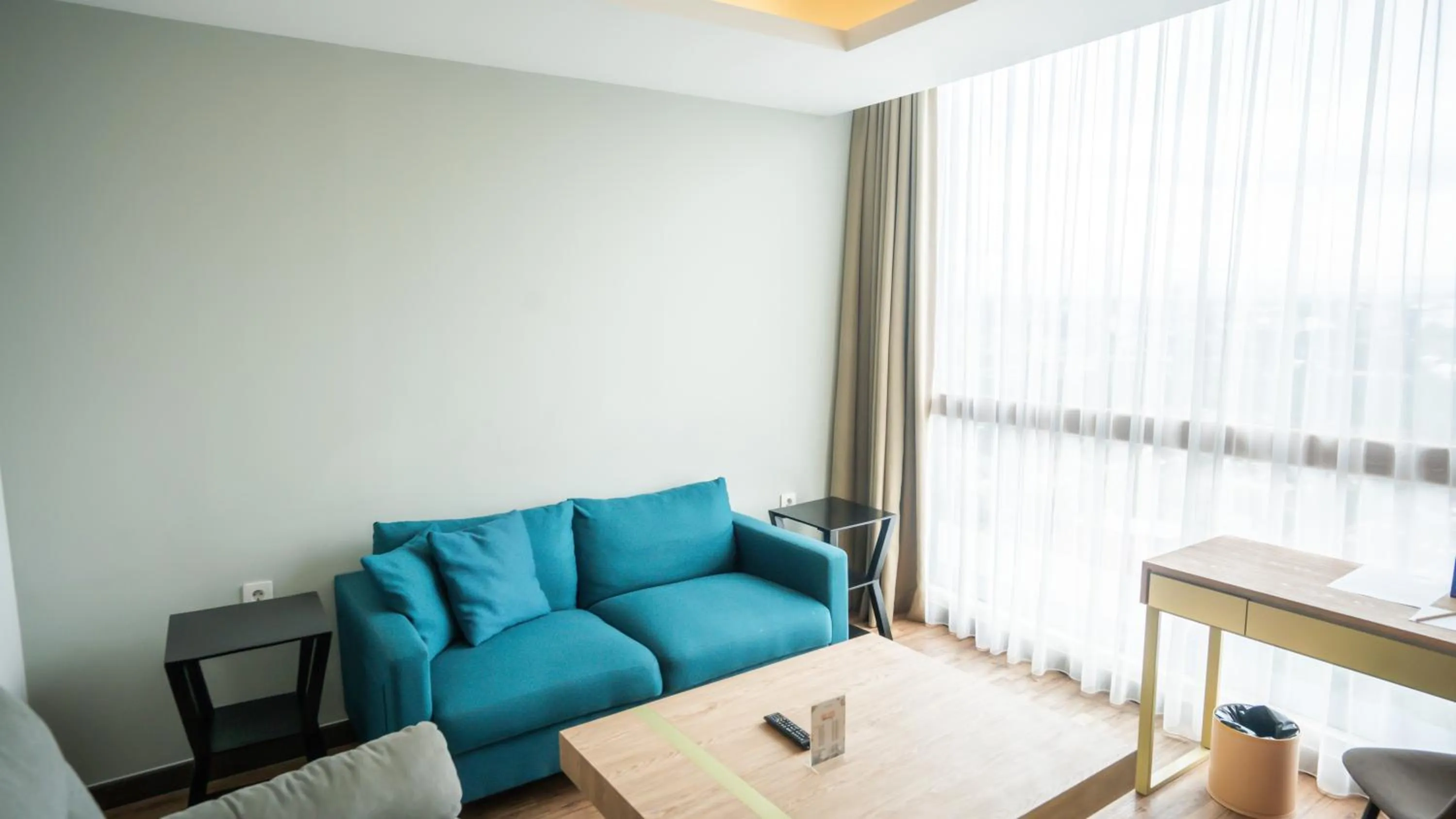 Living room in Bigland Bogor Hotel Powered by Archipelago