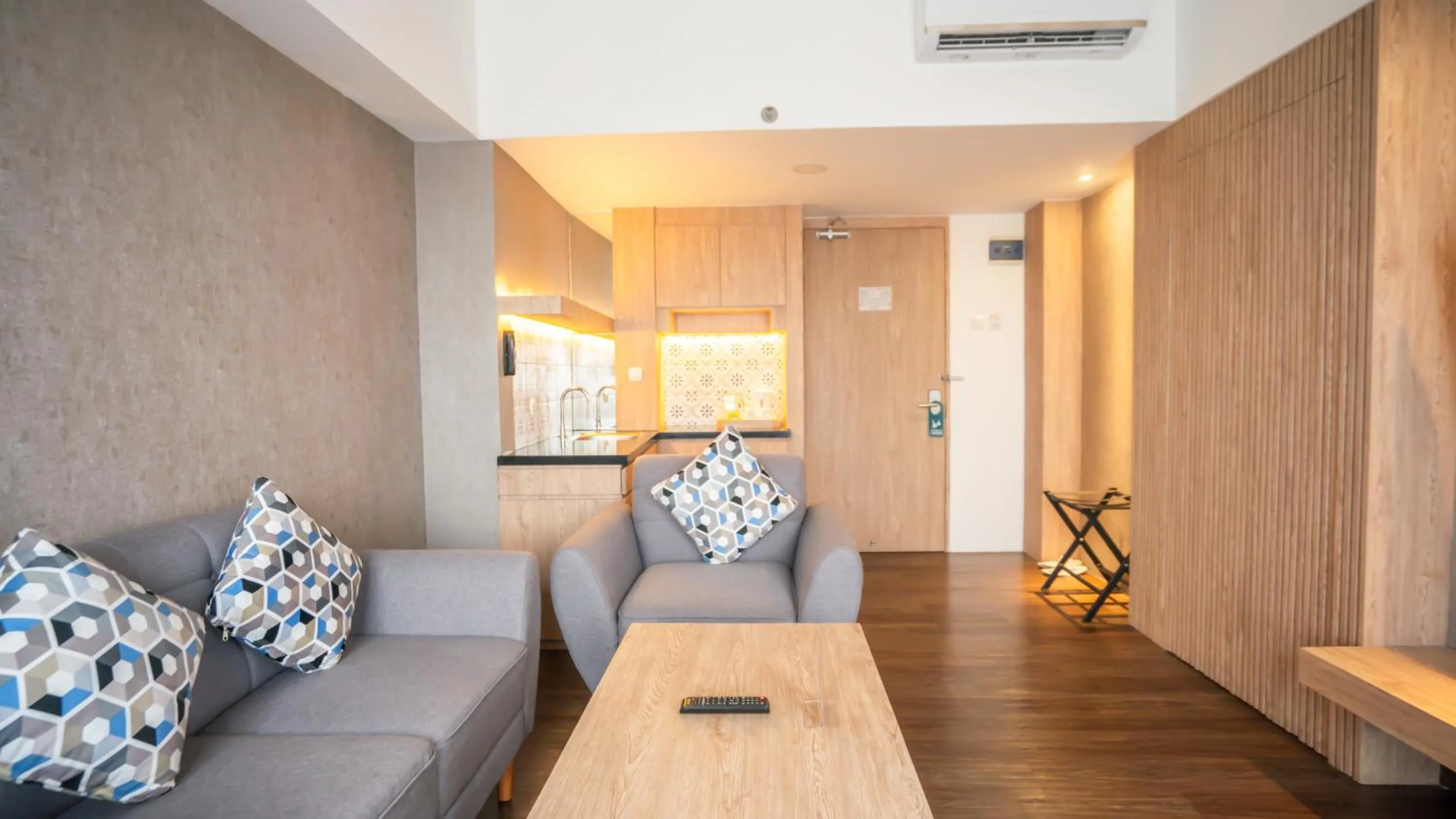 Living room in Bigland Bogor Hotel Powered by Archipelago