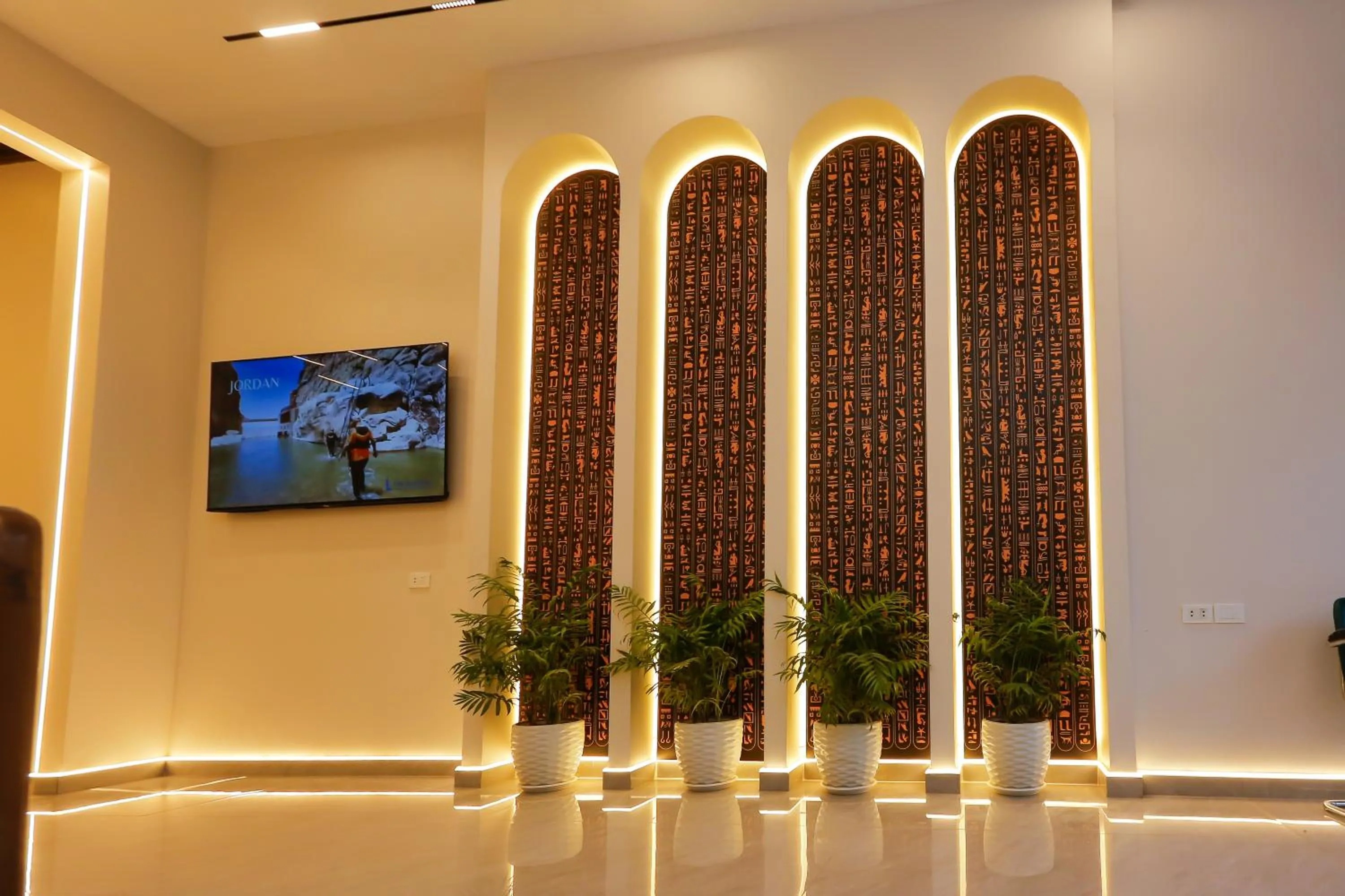 Communal lounge/ TV room in Pyramids Gem Plaza Boutique Hotel & Restaurant