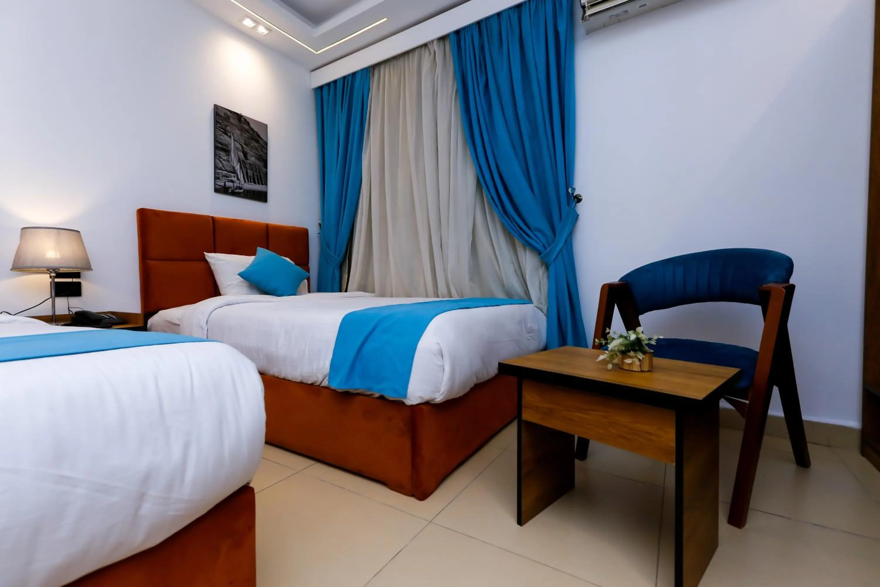 Photo of the whole room, Bed in Pyramids Gem Plaza Boutique Hotel & Restaurant