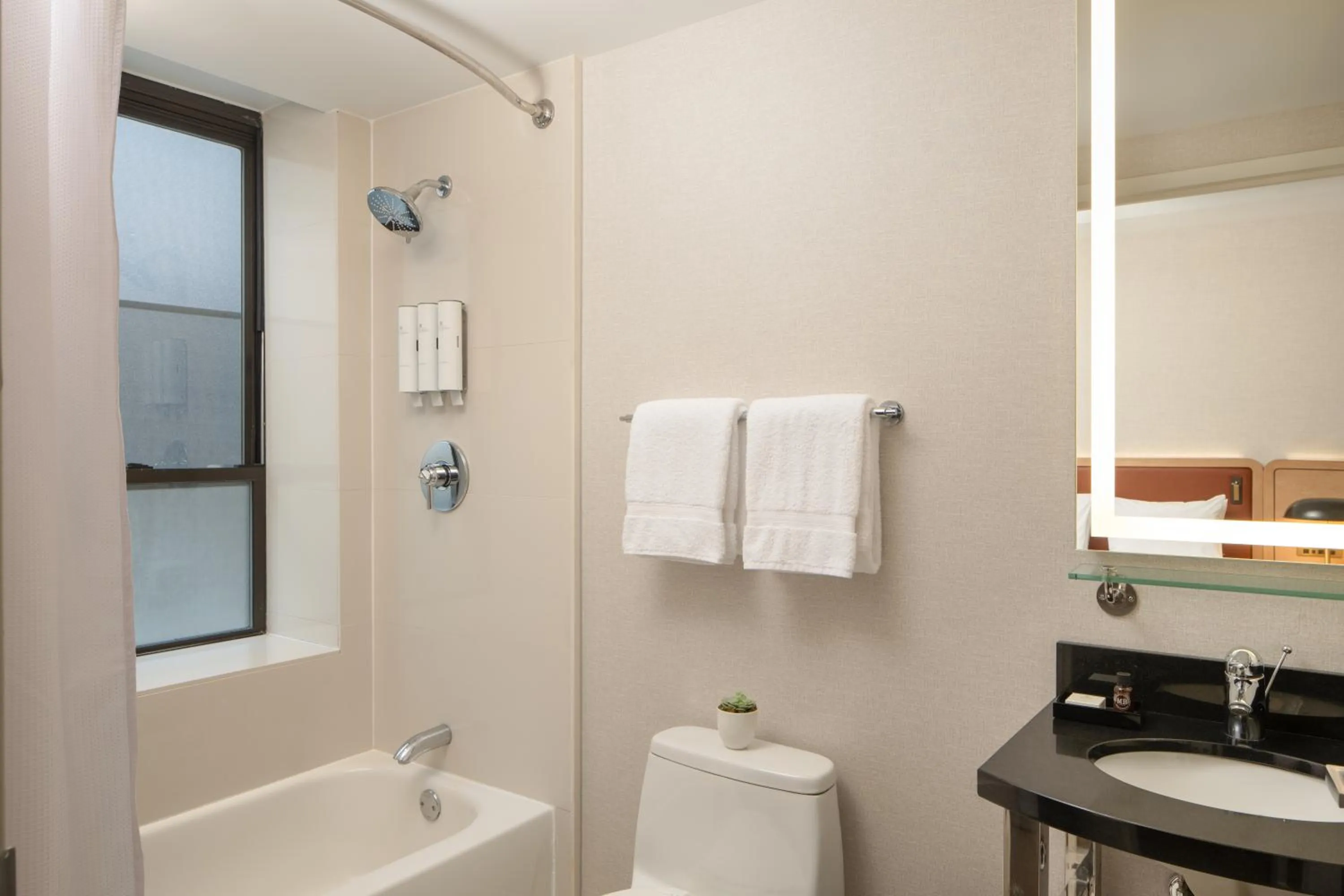 Shower in Aura Hotel Times Square Newly Renovated