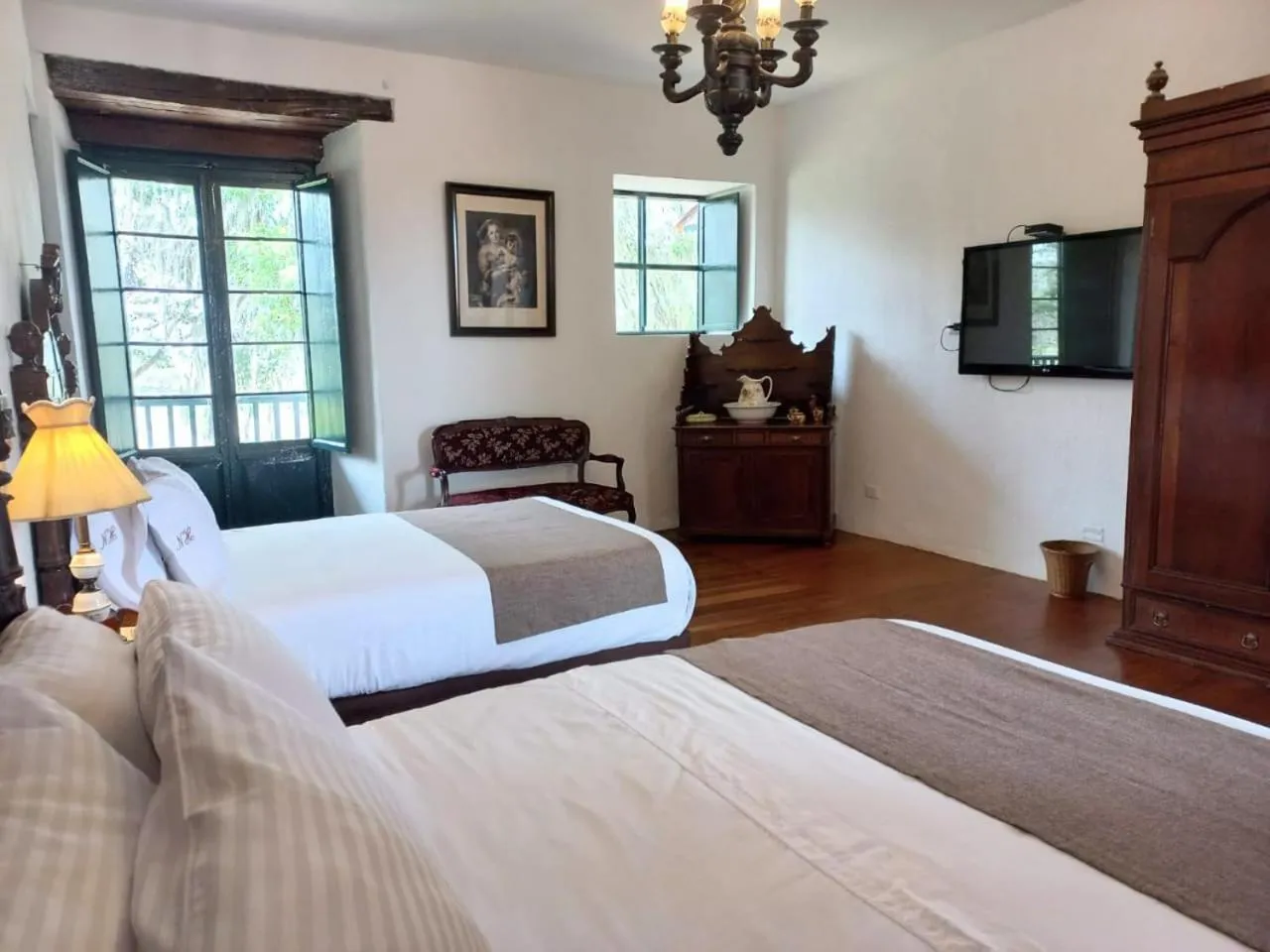 Photo of the whole room, Bed in Hotel Hacienda El Novillero