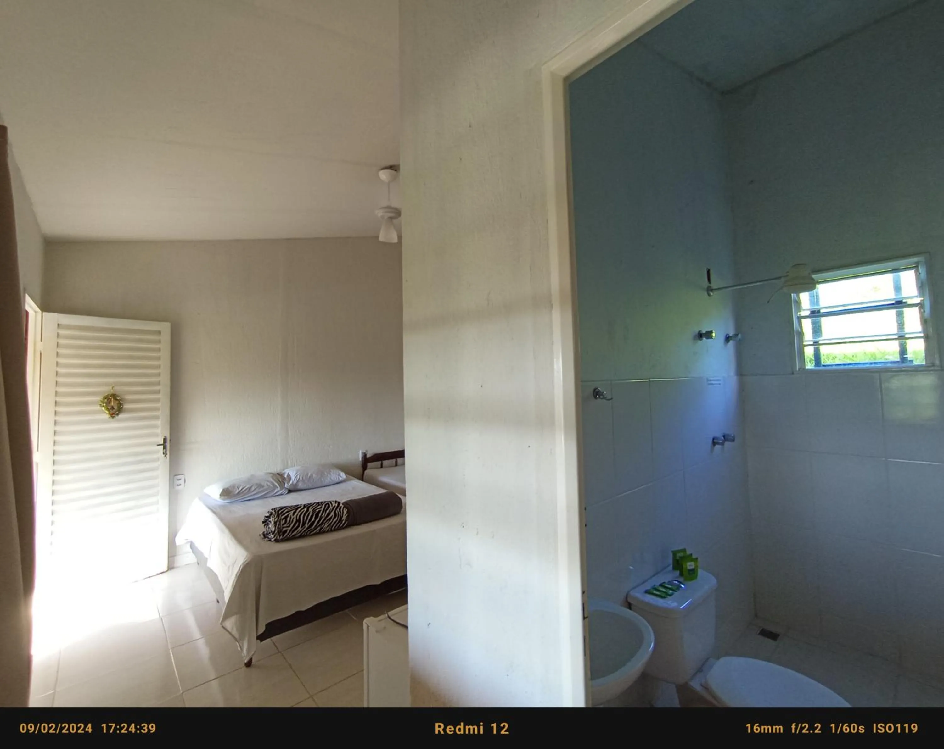 Bed in Pousada flores de ipê