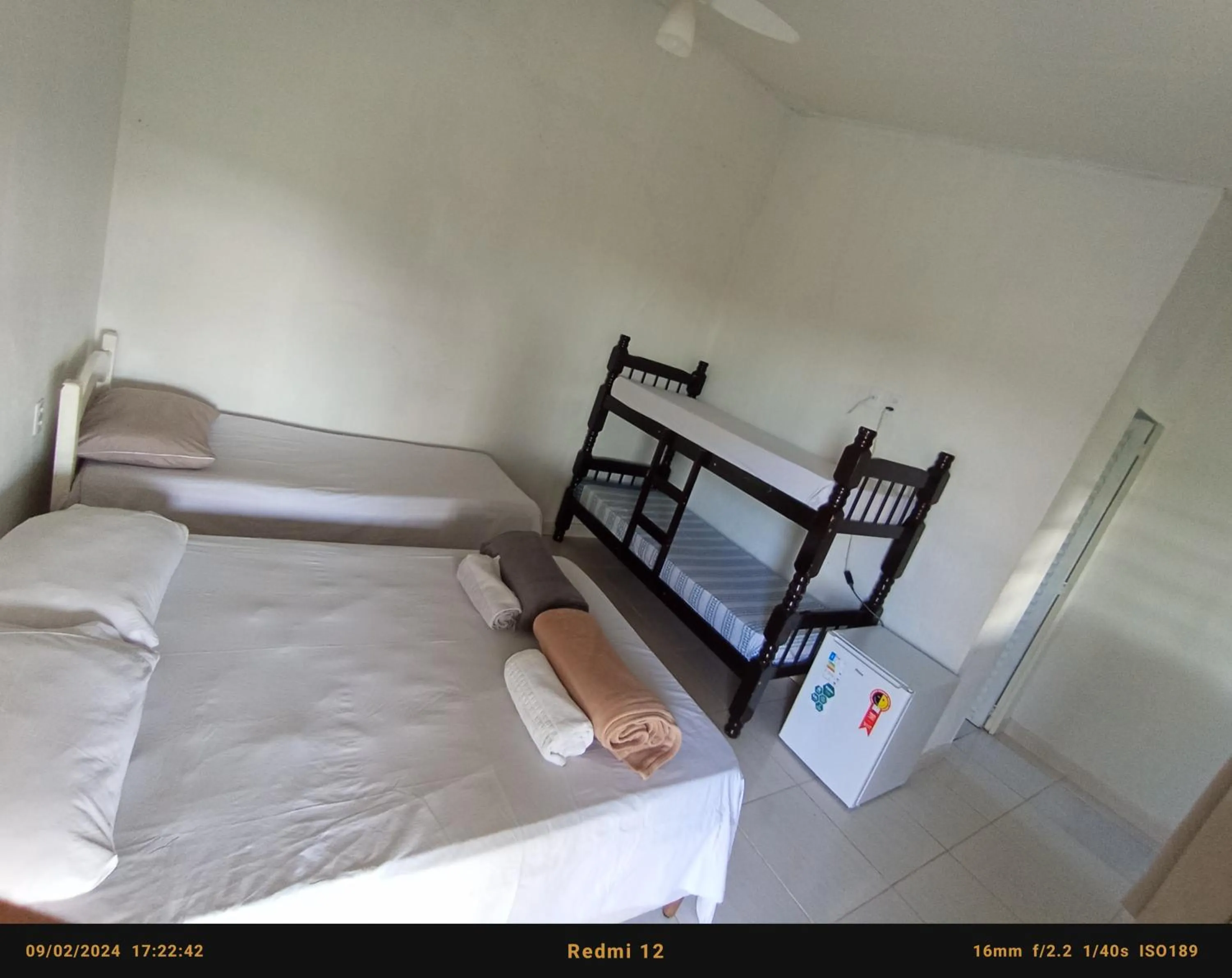 Bed in Pousada flores de ipê