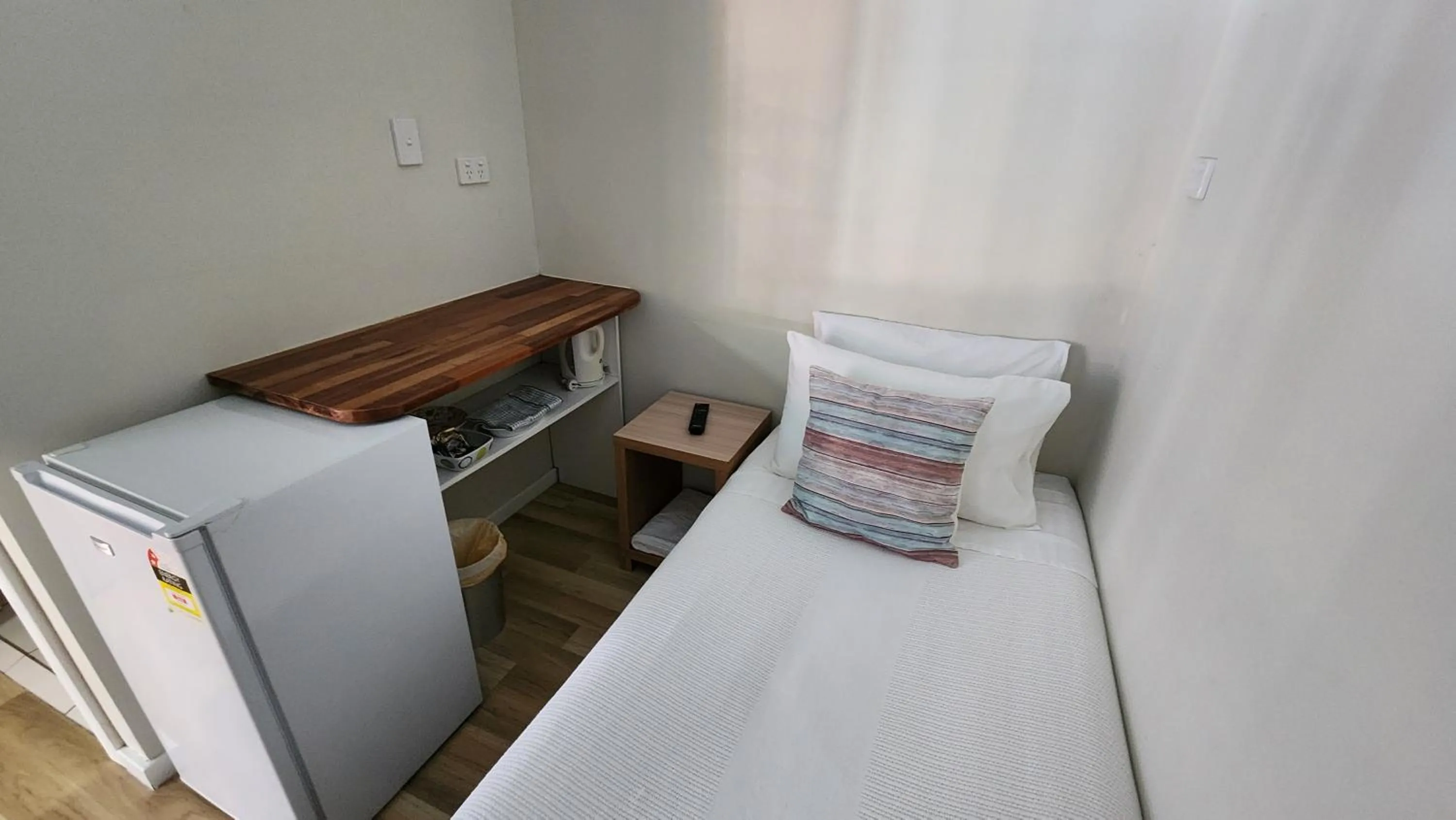 Bed in T's Resort & Motel