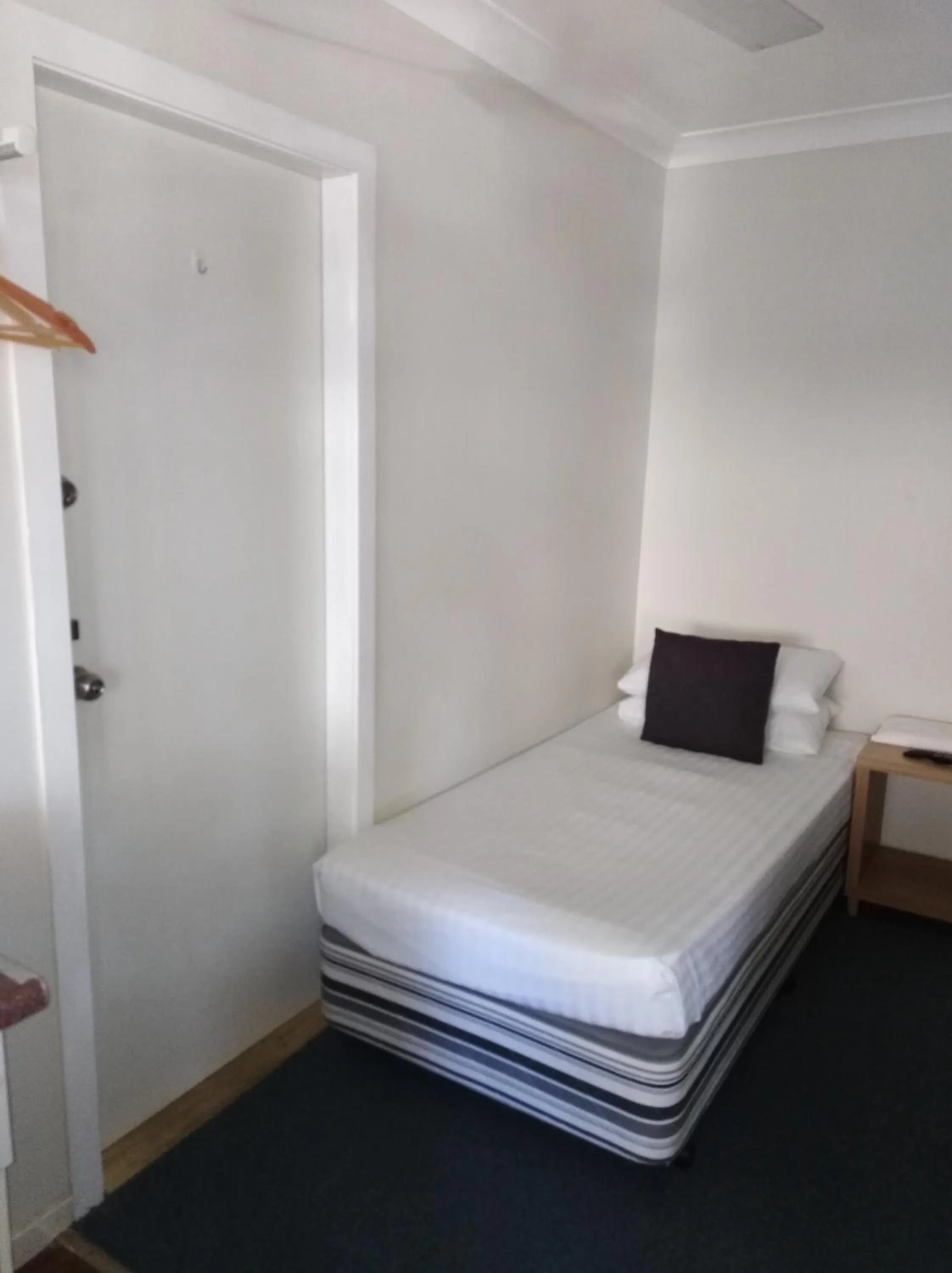 Bed in T's Resort & Motel