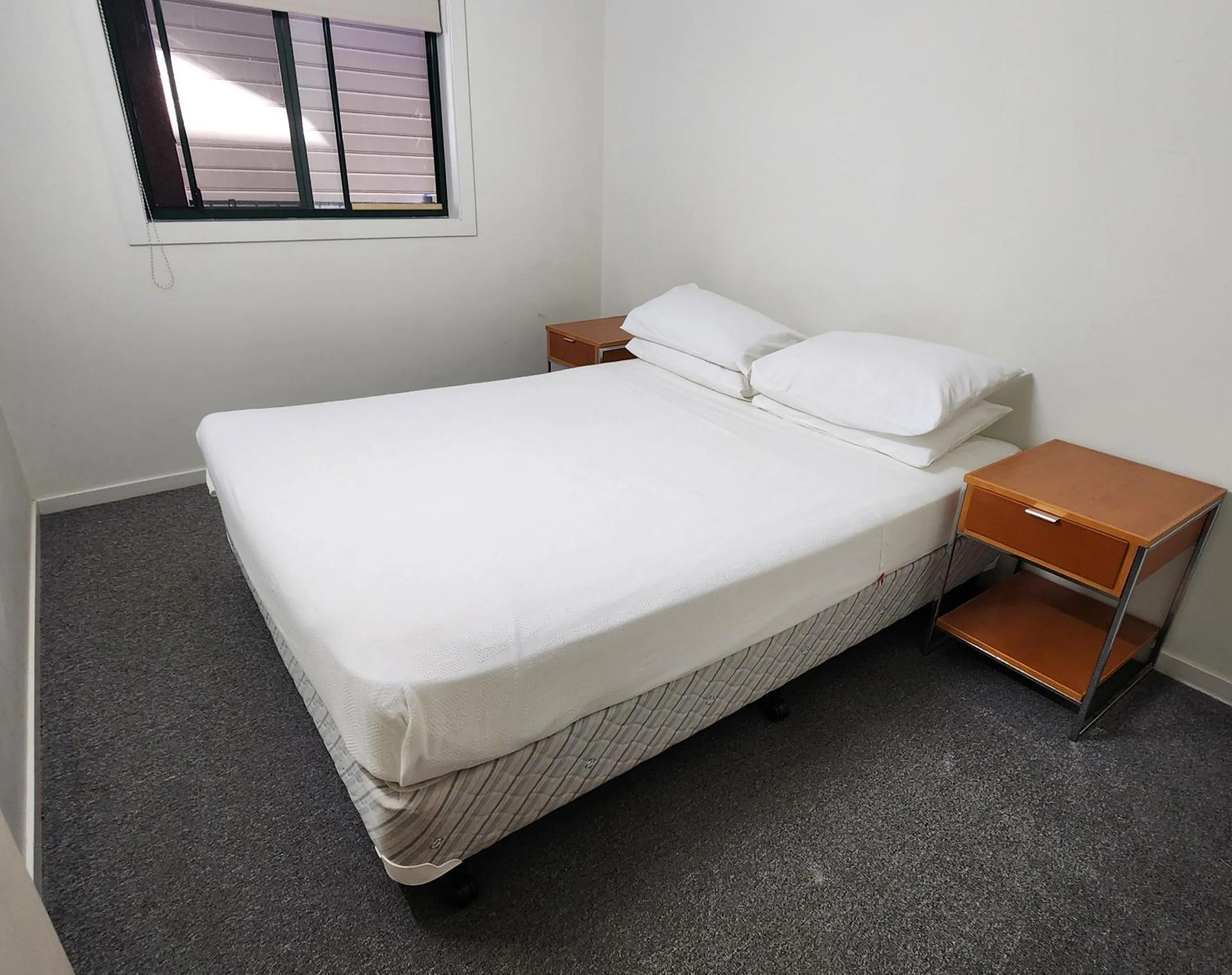 Bed in T's Resort & Motel