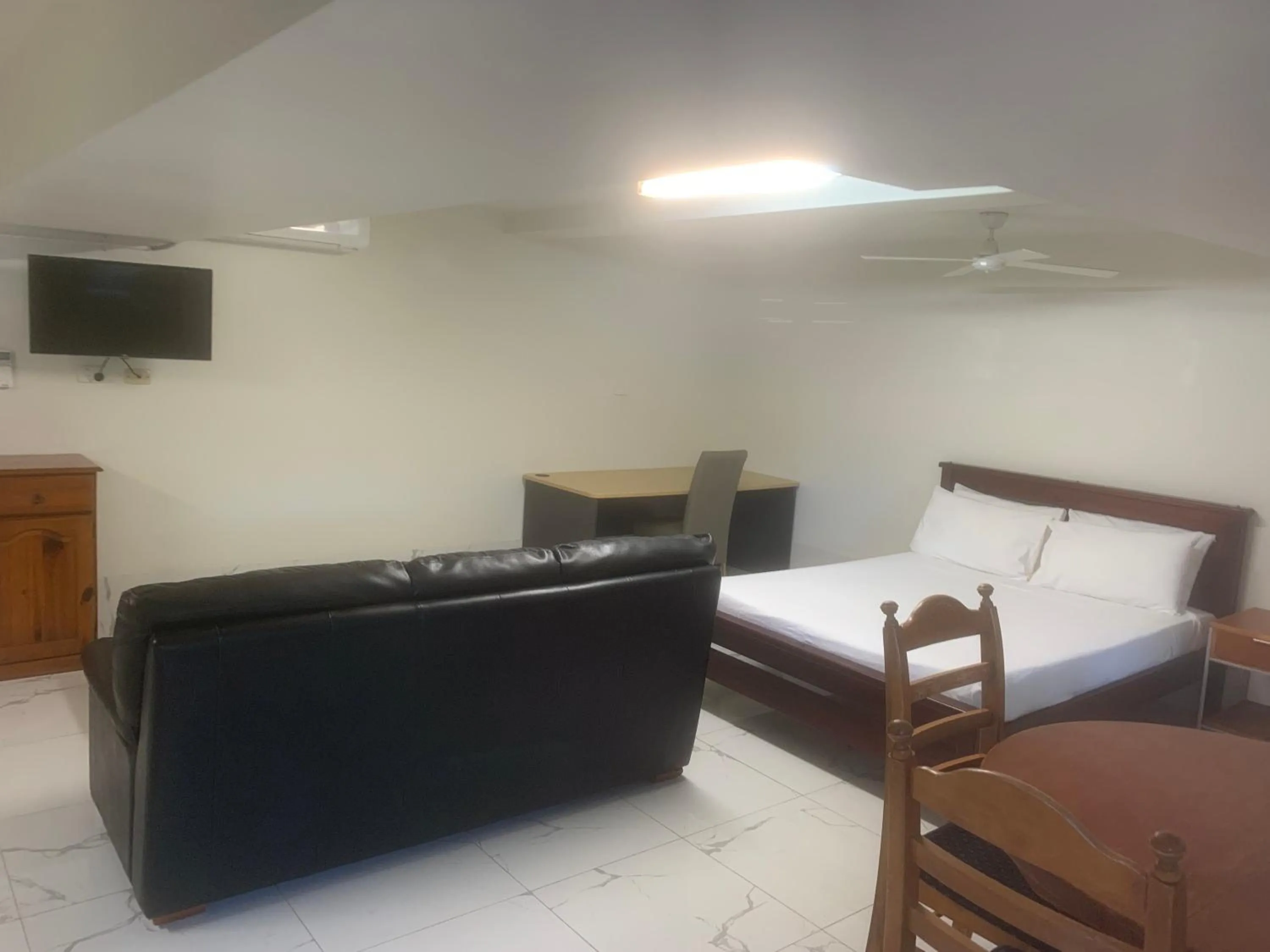 Bed in T's Resort & Motel