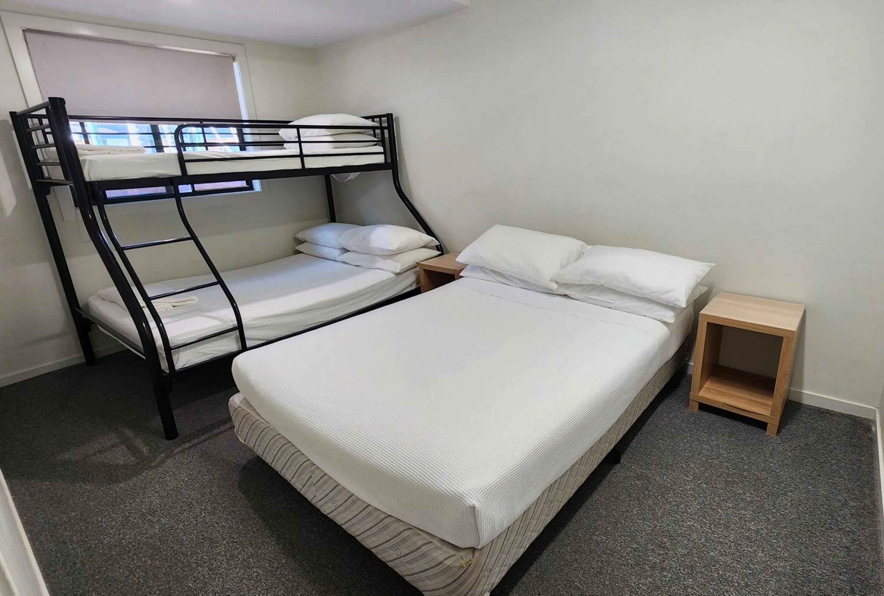 Bed in T's Resort & Motel