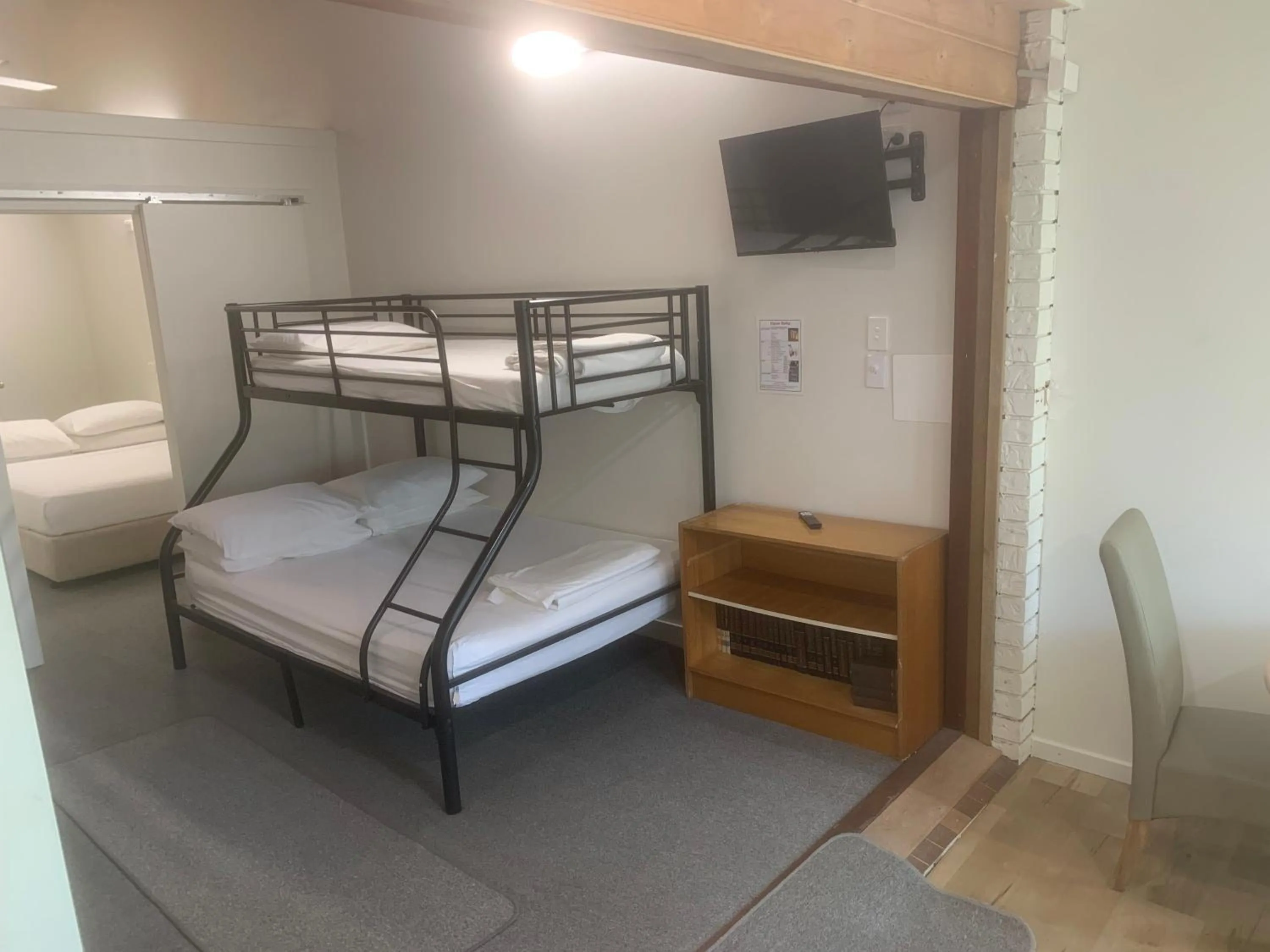 Bed in T's Resort & Motel