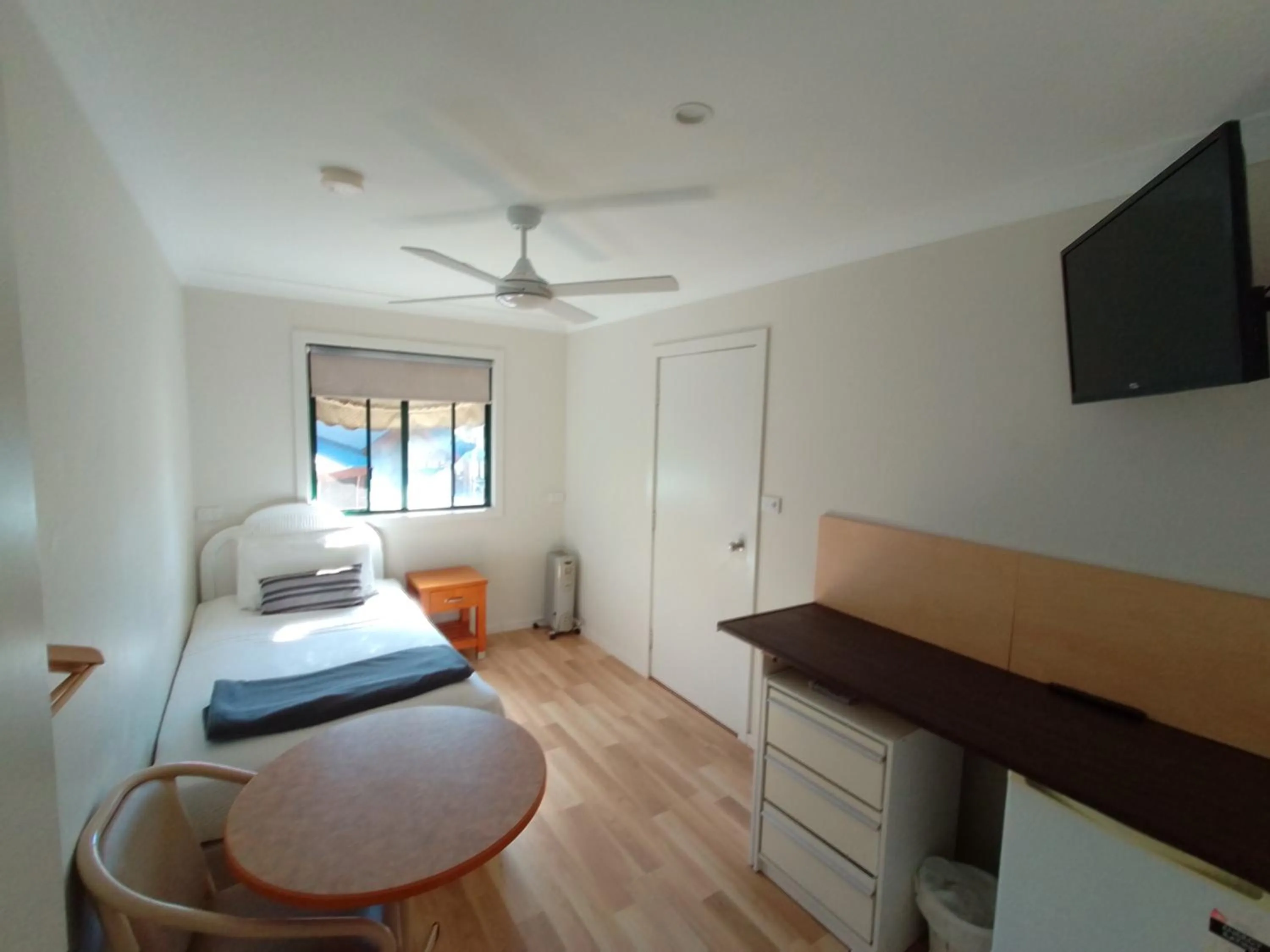 Bed in T's Resort & Motel