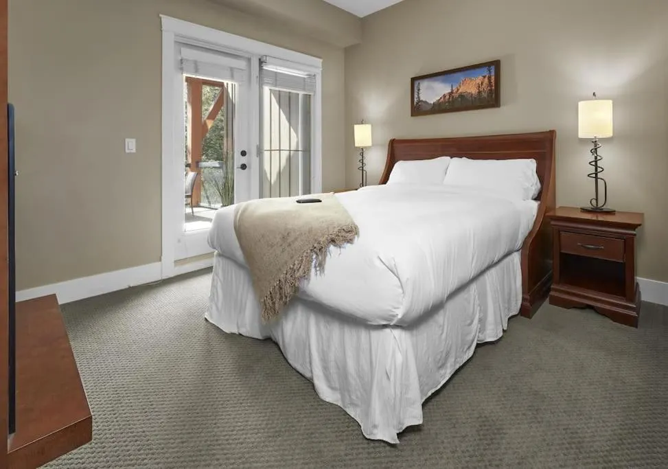 Bed in Star Suite -Luxurious condo with 3 fireplaces, and open Pool!
