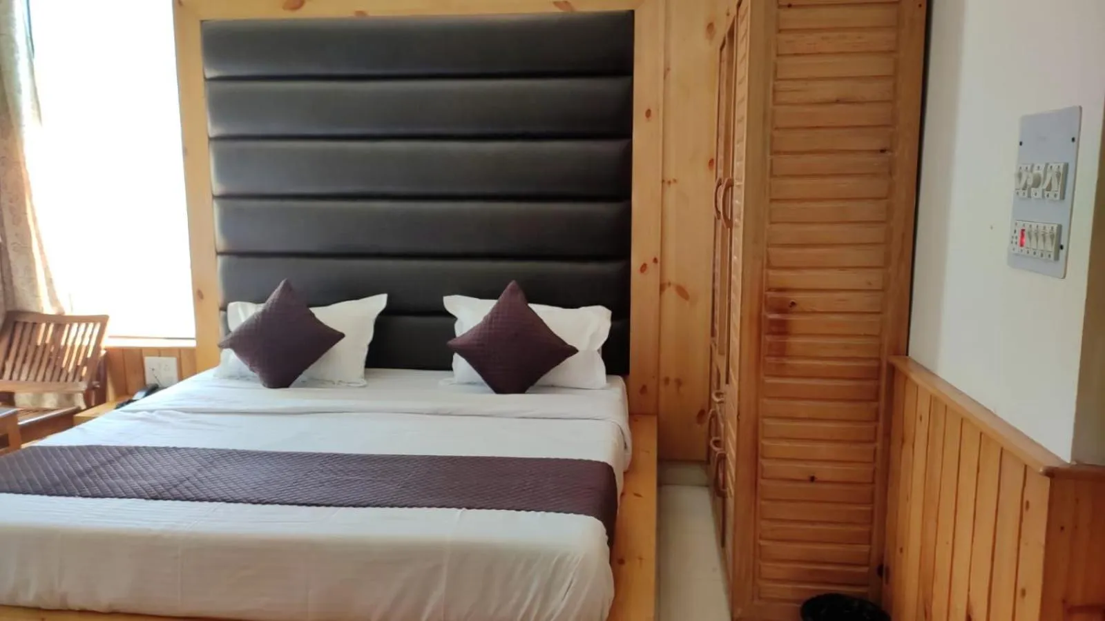 Bed in Greenwoods Inn Mcleodganj #Parking #lift #All Balcony Rooms #Rooftop Terrace #Prime Location # Close to the Triund Trek Point 400 Mtr Head