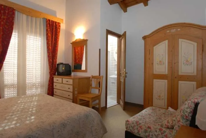 Photo of the whole room, Bed in Hotel Alpi - Foza