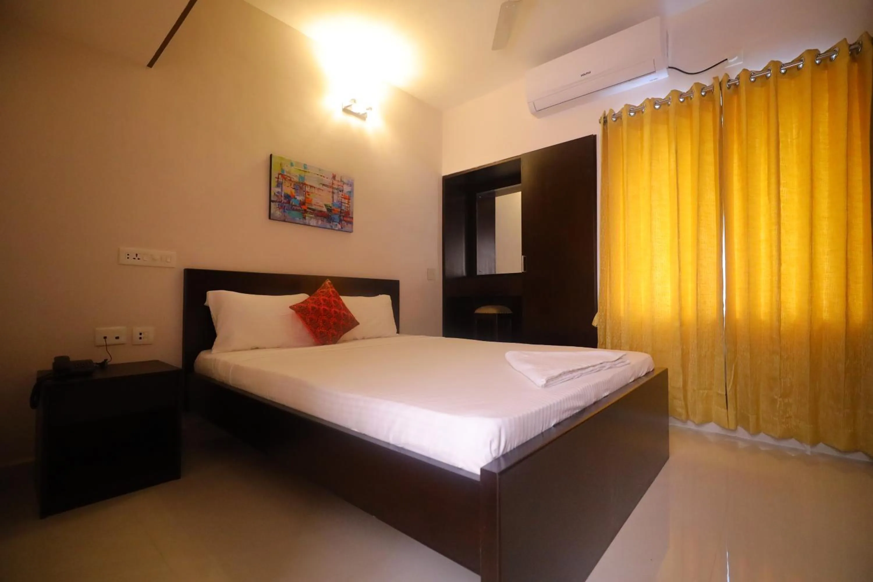 Bed in Kfour Apartment & Hotels Private Limited