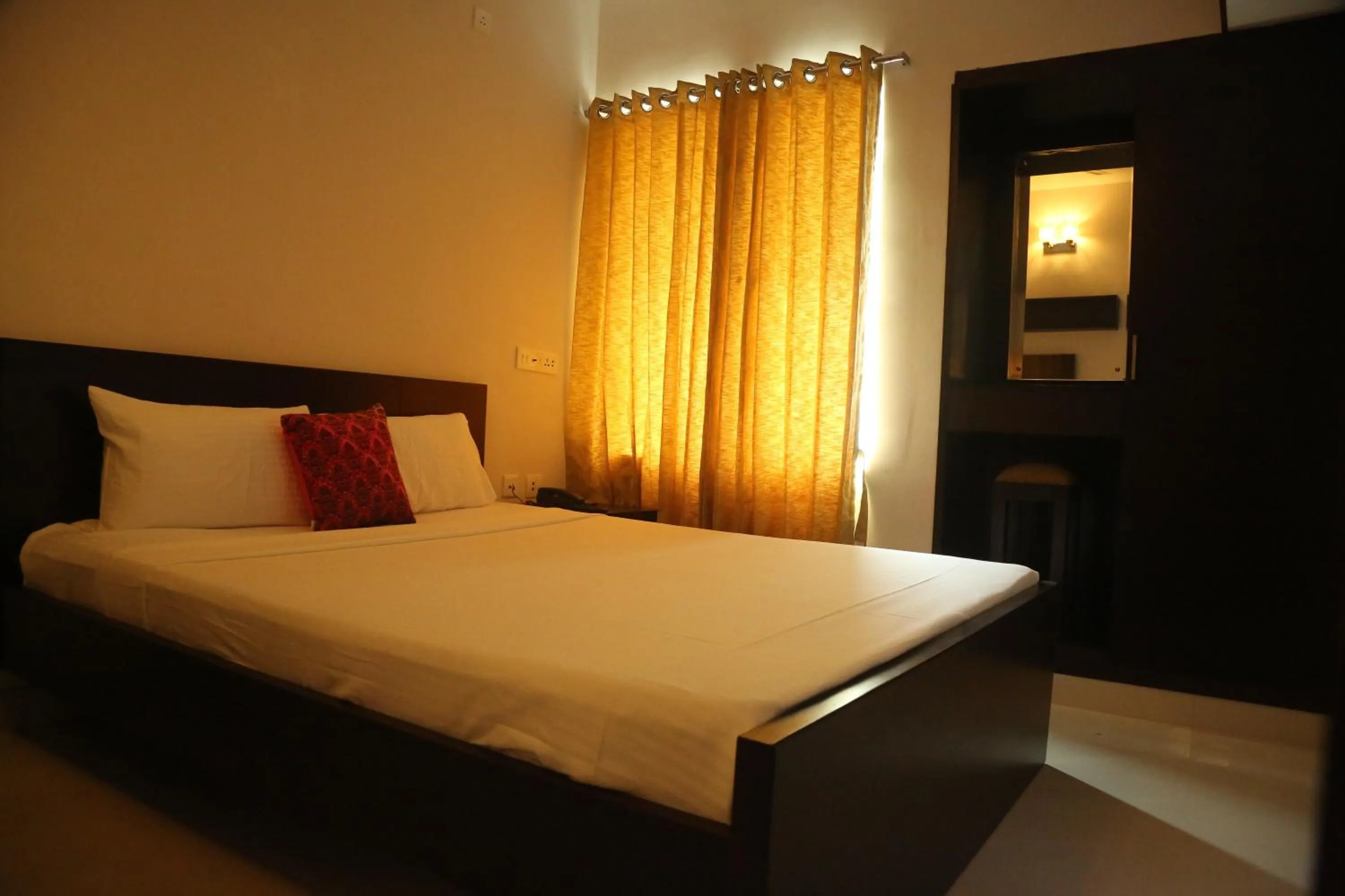 Bedroom, Bed in Kfour Apartment & Hotels Private Limited